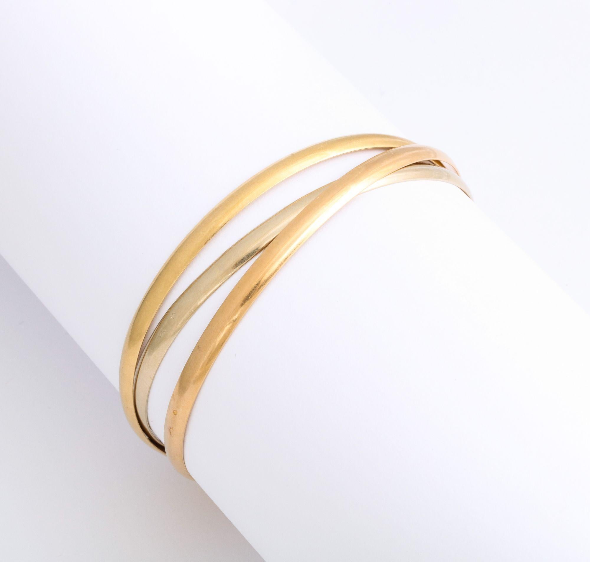 French Rolling Bangles in Tricolor Gold For Sale 1