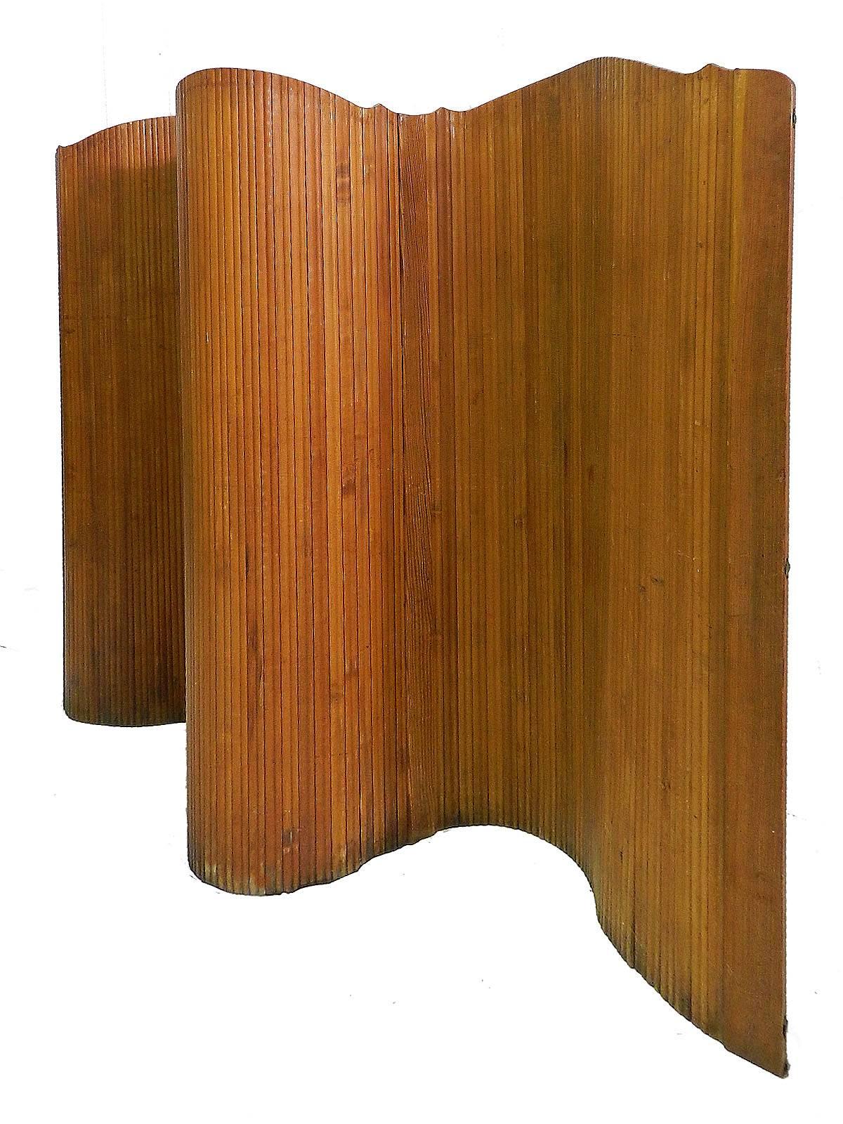 French room divider wood roll up screen by S.N.S.A Midcentury
A firm pitch pine room divider flexible that rolls up neatly
France Art Deco, 1930-1950
Signed with applied brass manufacturer´s labels there are three down each end
Rolls up to 30cms