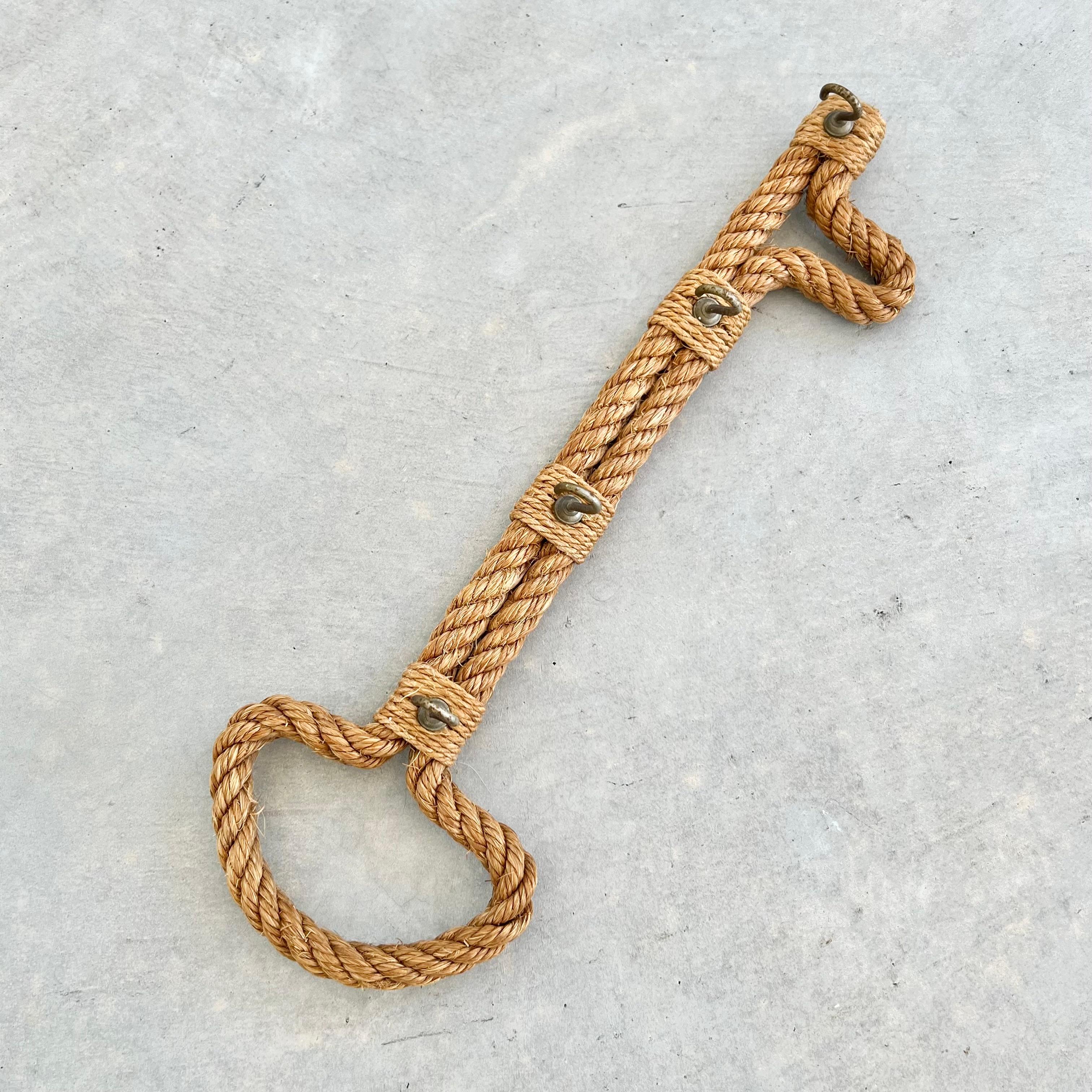 French rope key holder by Audoux and Minet. Intertwined rope with 4 hooks to hang keys. Perfect key hook in the shape of a large key for your entryway. Fun piece of practical design for your home. Good vintage condition.
 