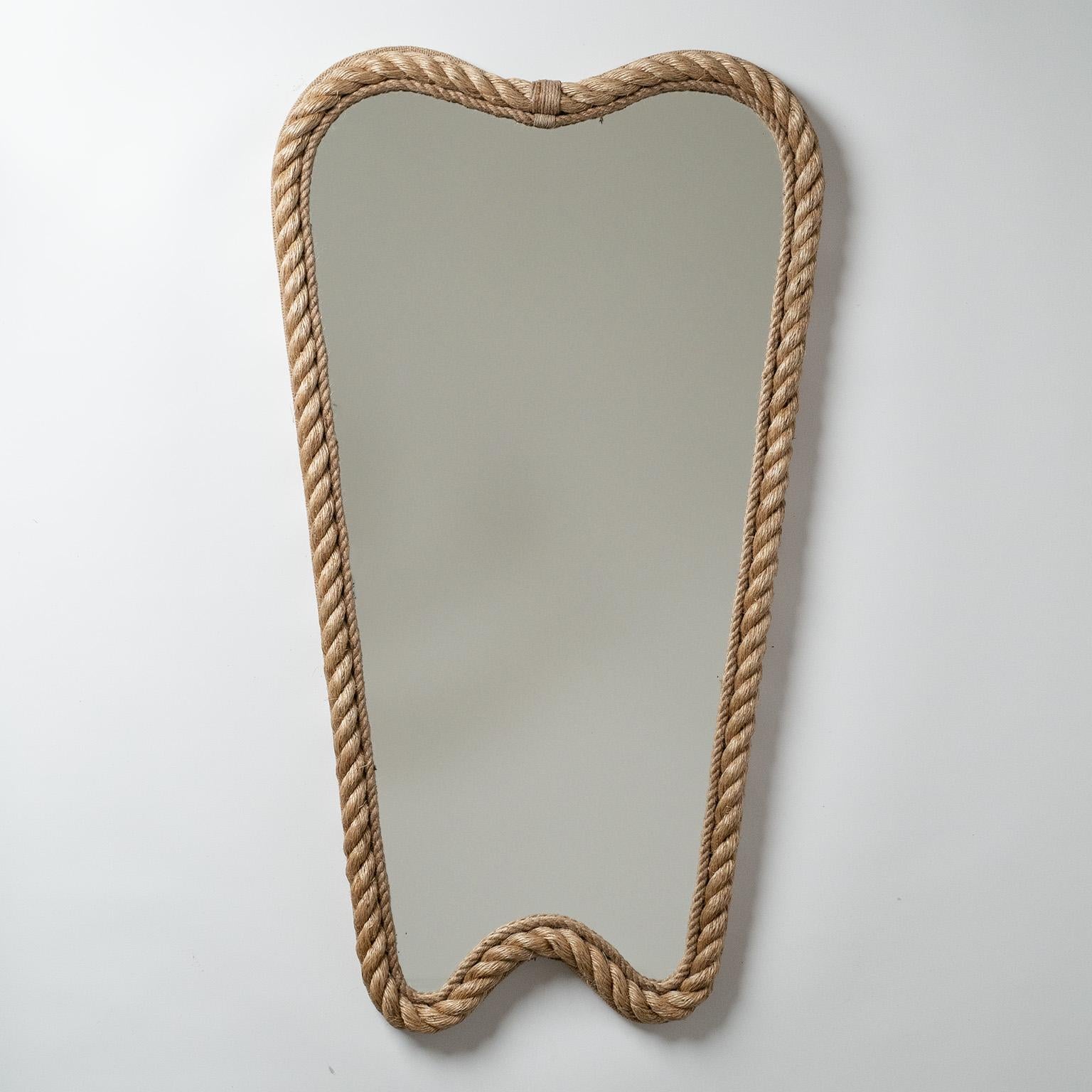 Lovely French artisanal rope mirror in the style of Adrien Audoux and Frida Minet. Slim, tall design with a thick twisted rope along the border. Width at the bottom is 34cm/13.5inches.