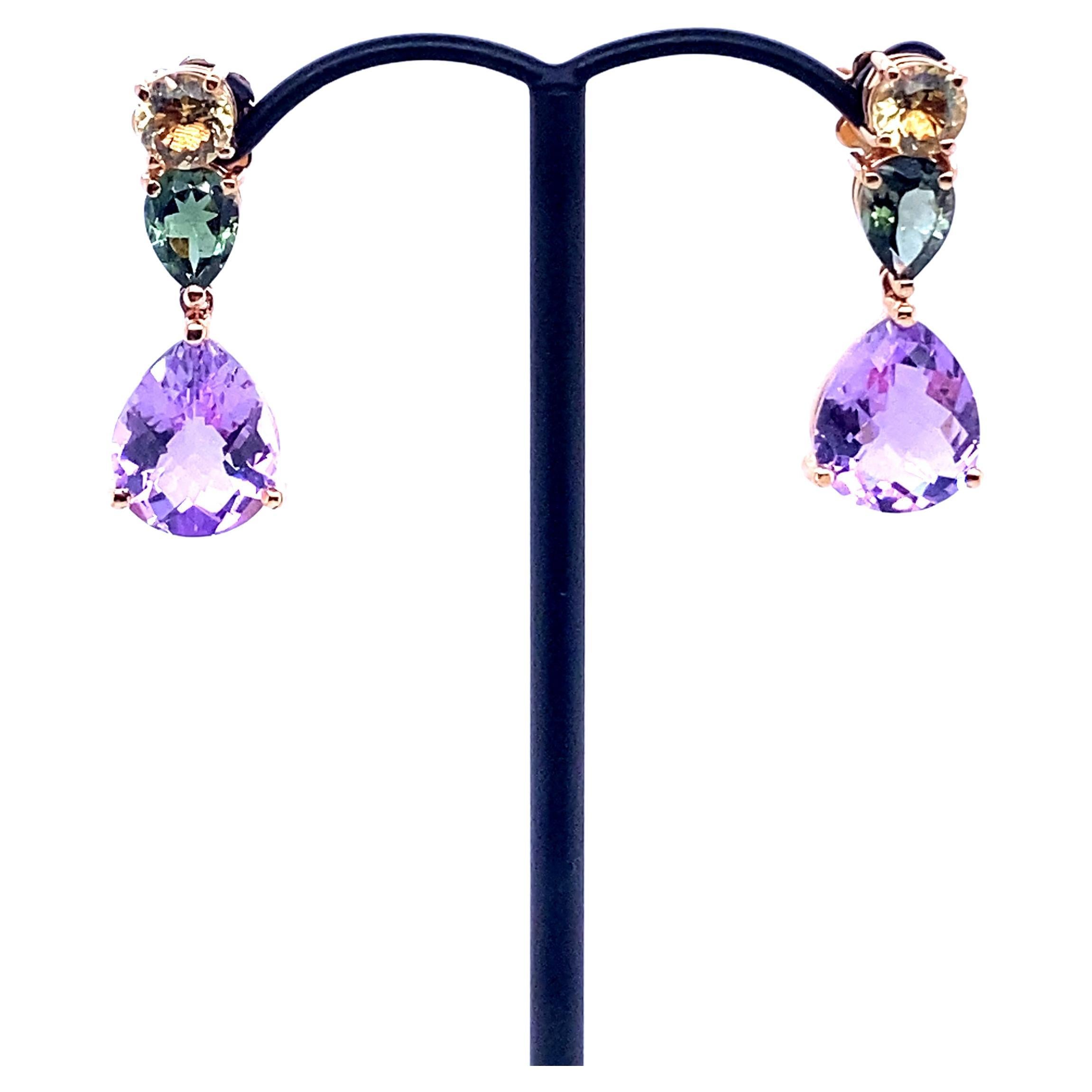 French Rose Gold Earrings Accompanied by a Amethyst, Citrine and Tourmaline
French Collection by Mesure et Art du Temps.

The Amethyst is 1cm in length and 0.9 cm in width.
The Tourmaline is 0.7 cm in length and 0.5 cm in width.
The Citrine is 0.5