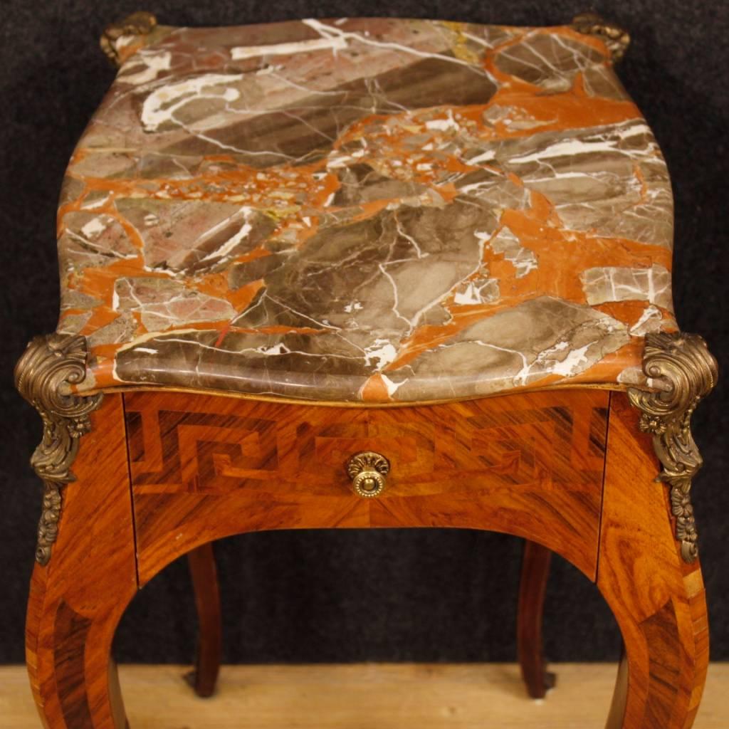 French side table in Louis XV style. 20th century furniture richly inlaid in rosewood and palisander. Side table for living room with a drawer of discreet service. Built-in marble in excellent condition. Side table decorated with chiselled bronzes