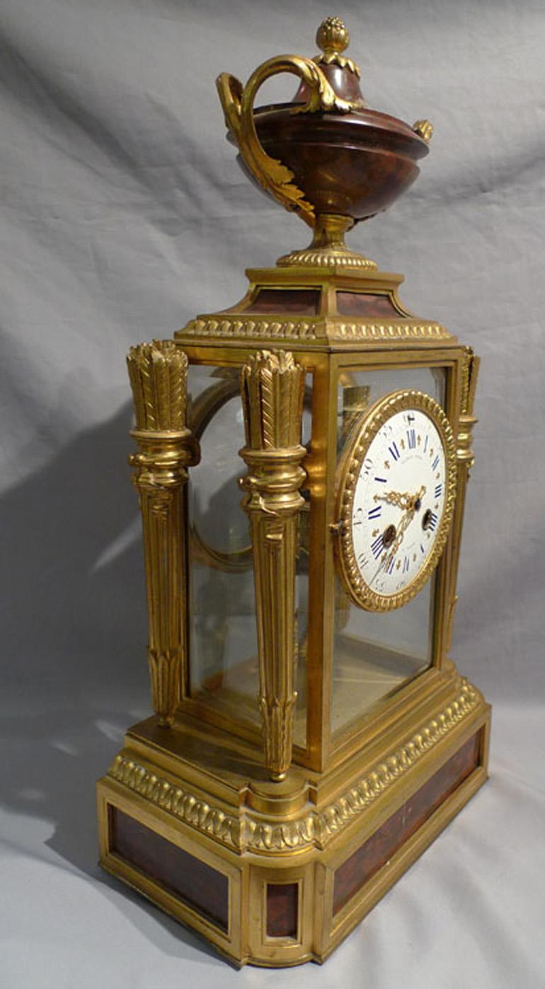 Glass French rouge marble and ormolu four glass clock signed Raingo Freres For Sale