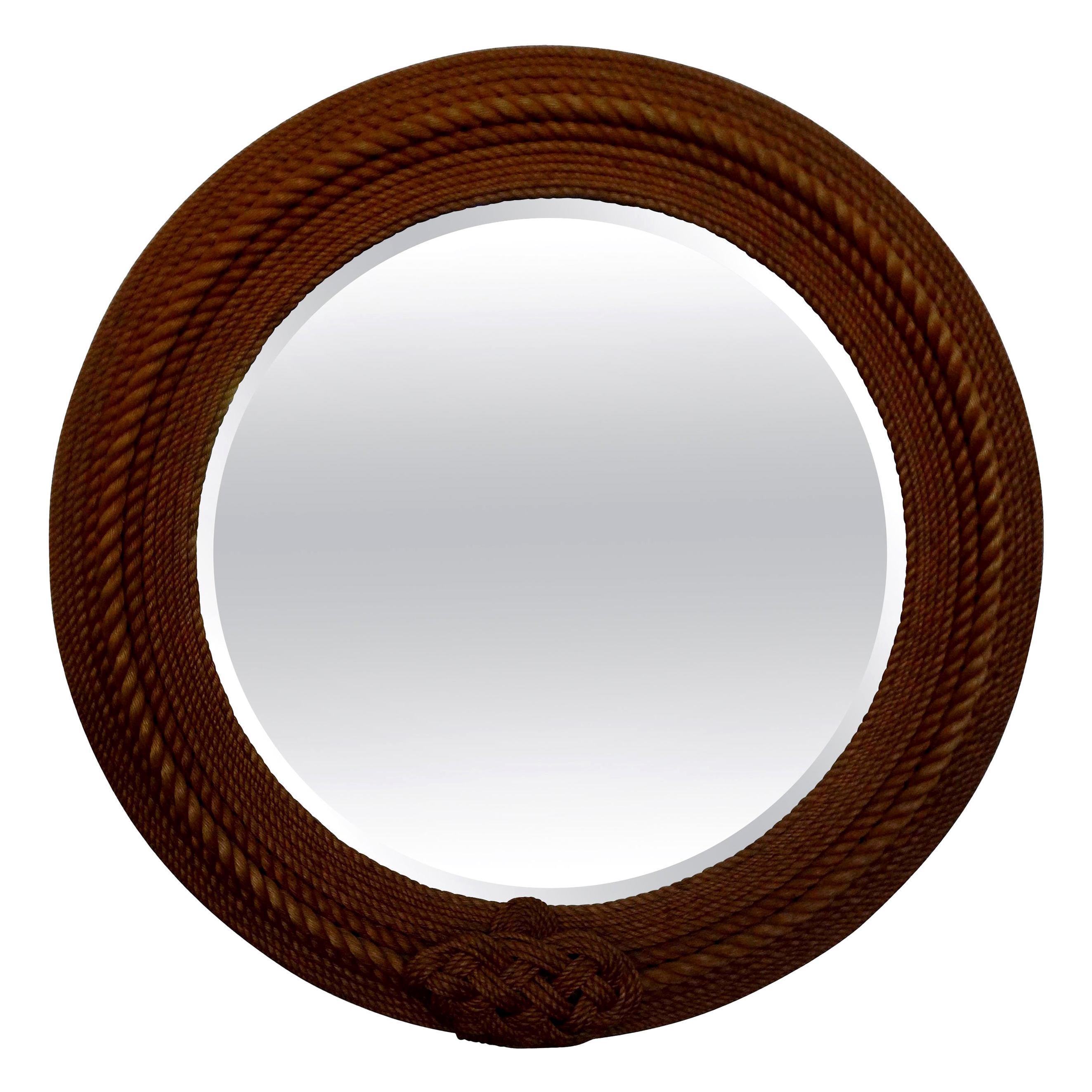 Huge French round rope beveled mirror by Adrien Audoux & Frida Minet. This stunning rope by Audoux & Minet mirror was made in Golfe-Juan, France, circa 1950s. It's in extremely good condition given its age. Featured French rope beveled mirror has a