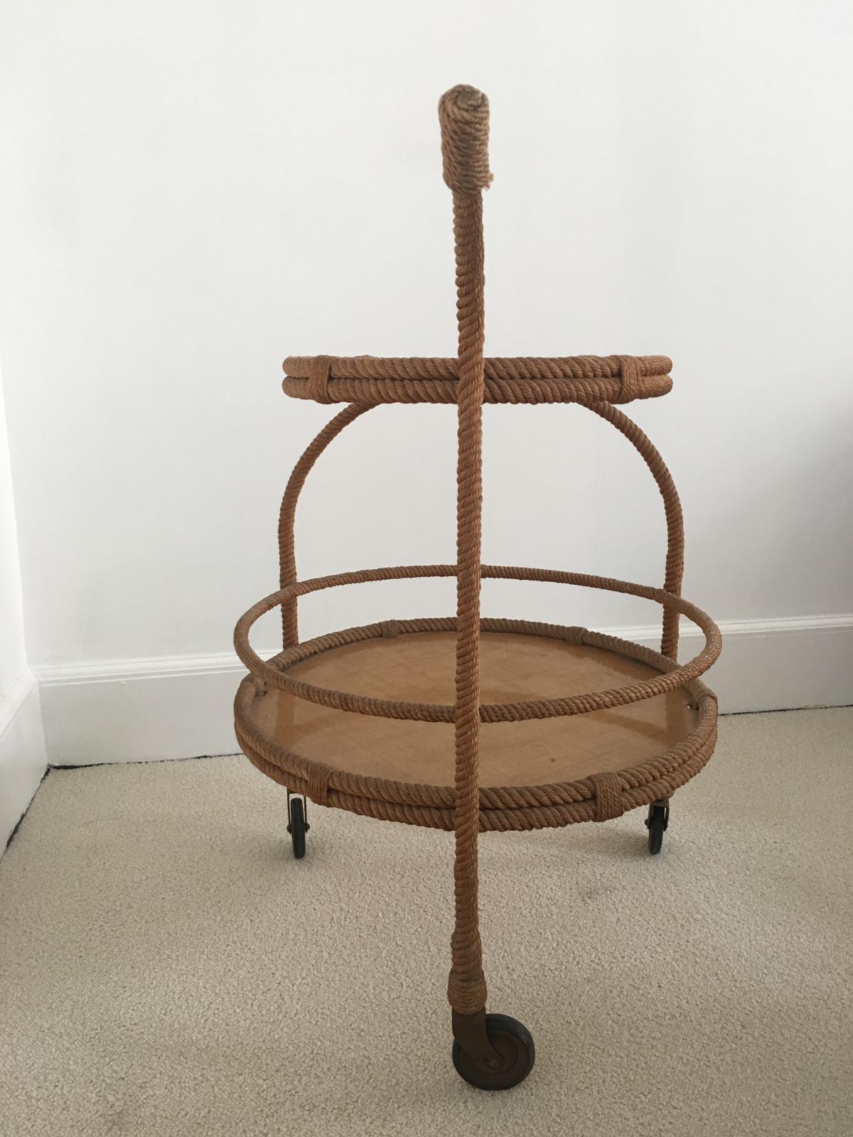 Serving cart - Bar with 2 round fiber glass trays on wheels and in braided rope.
This particular bar cart was designed by Adrien Audoux & Frida Minet and manufactured by Vibo France, circa 1960 and in very good and original vintage condition.
 