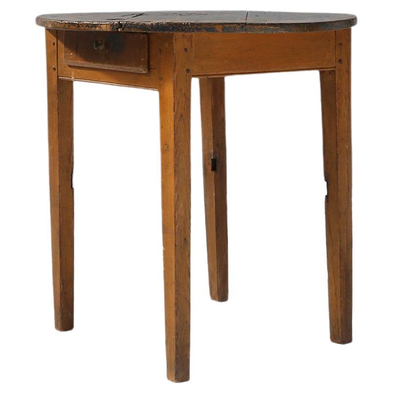 France / 1850 / rustic round side table / oak / rustic / mid-century

Very beautiful antique French table with round blue top standing on slightly tapered legs. There is a drawer under the top. Made in France (circa 1850) in full oak. The table has