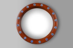 French round wooden mirror with elegant blue and white glass decoration, 1960s