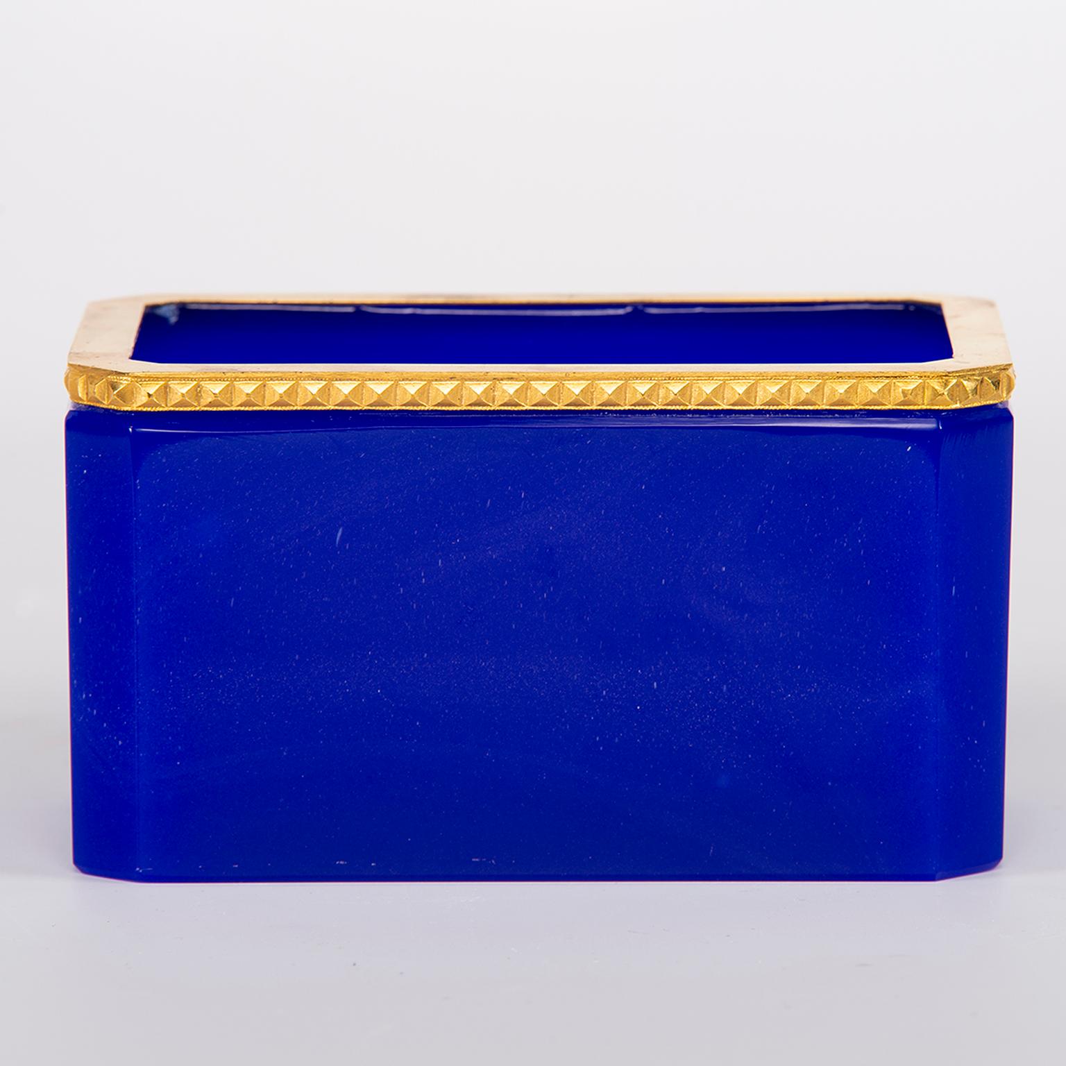 French brilliant royal blue rectangular opaline glass dish with polished brass trim, circa 1920s. Unknown maker.