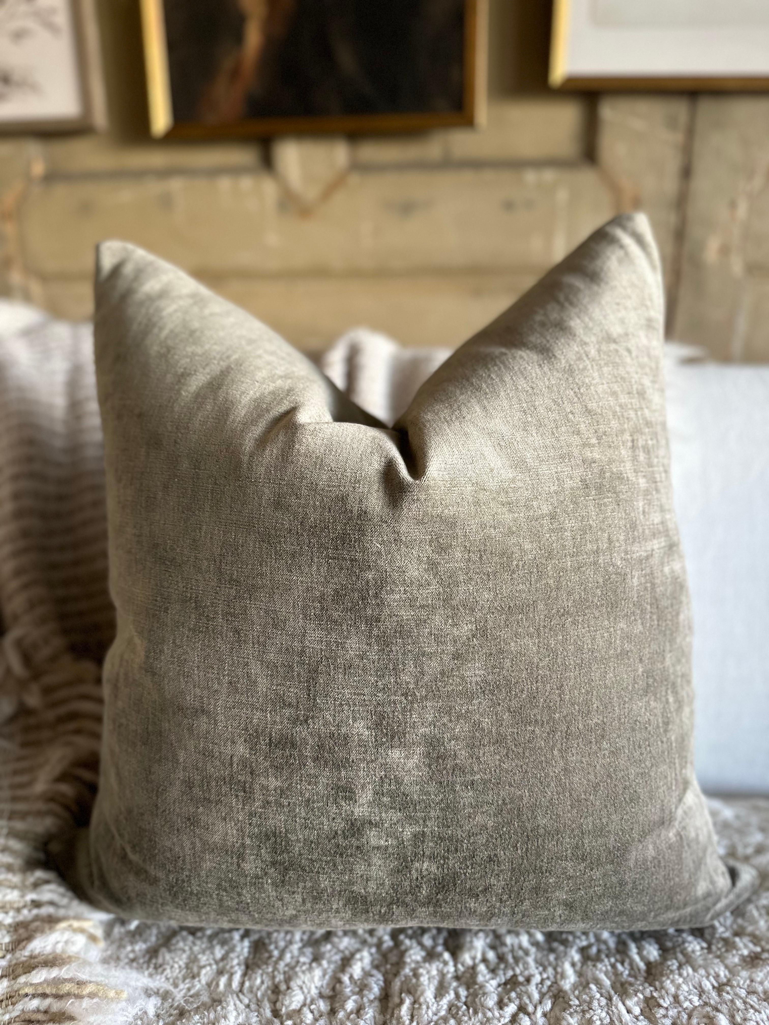 A luxurious Royal Velvet face with stone washed linen back.
Linen & Velvet fabric is imported from France.
Custom made to order, can be customized to your size.
Color: Kaki
Antique brass zipper
Size 22x22
Includes Down Feather Insert
Care: Can be