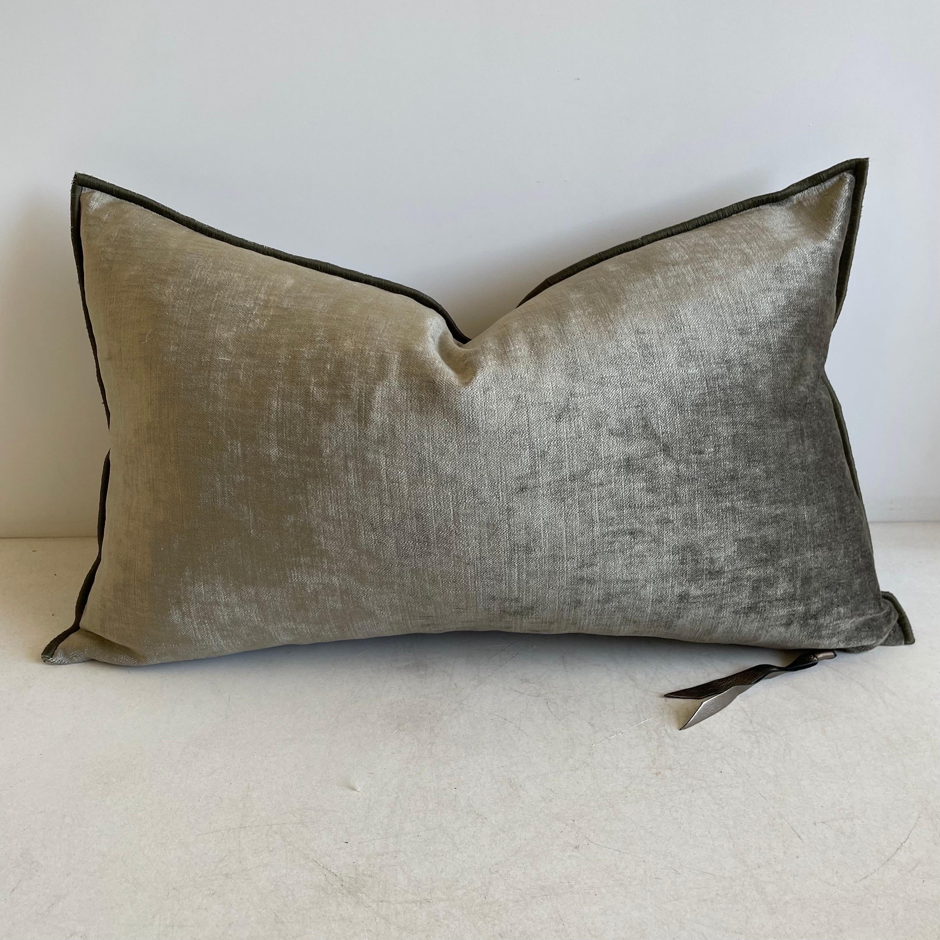 Beautiful deep French Royal Velvet Lumbar Pillow in Kaki color.
Kaki has a deep earthy tone in deep green gray.
Velvet lumbar with binded edge. 
Metal zipper closure, and leather pull. If this item is backordered, please allow 8-10 weeks for