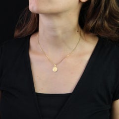 French Ruby Diamond 18K Yellow Gold Plus Qu'hier Moins Que Demain Pendant