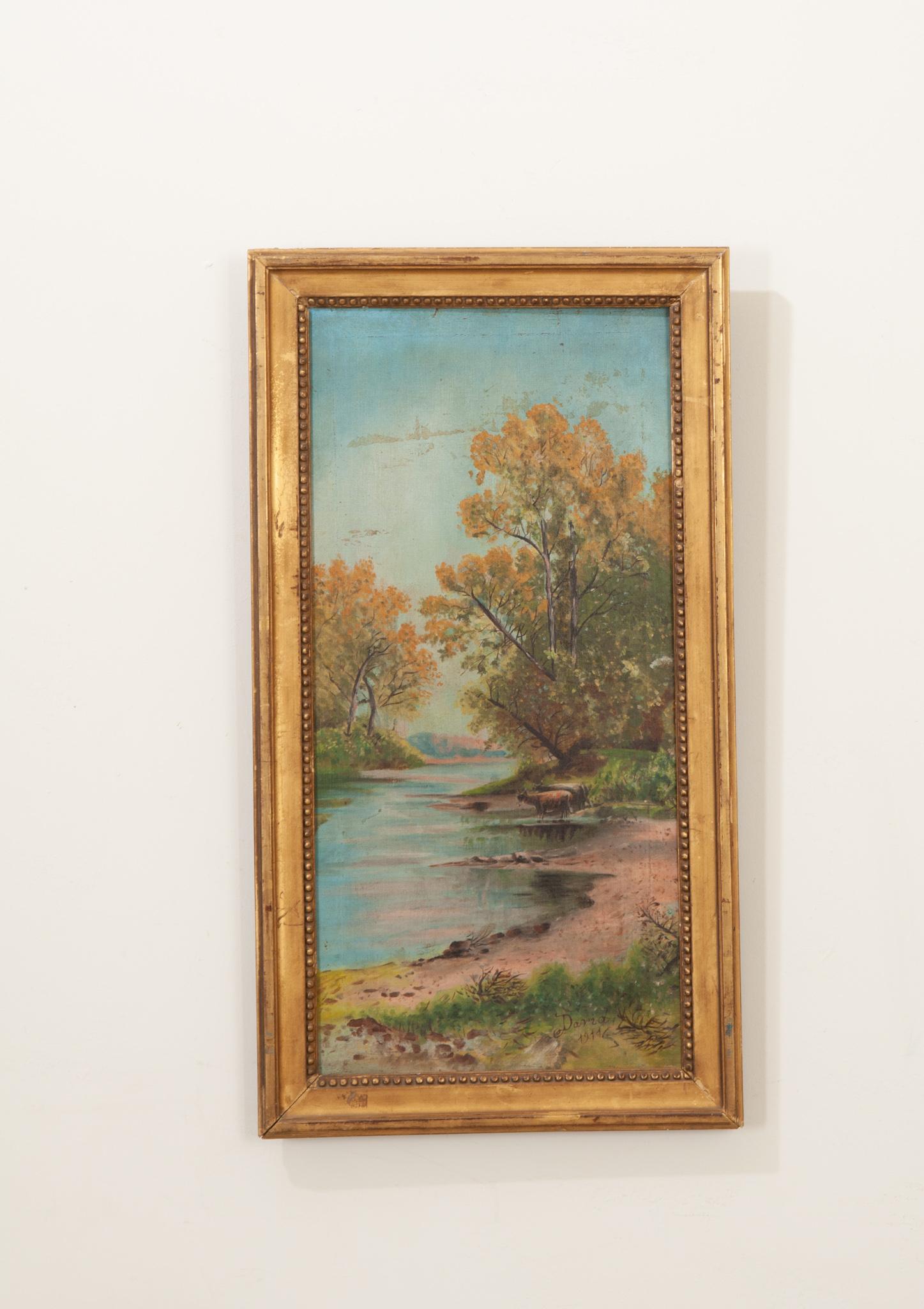 A charming vertical landscape painting in a carved gilt frame. Signed and dated on the bottom right hand corner- “Darid 1914”. Fixed with a wire on the back and ready to be hung in your interior. Make sure to view all of the images to get a closer