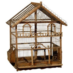 Napolon III cage à oiseaux rustique en bois avec motifs en métal à volutes, France, années 1860