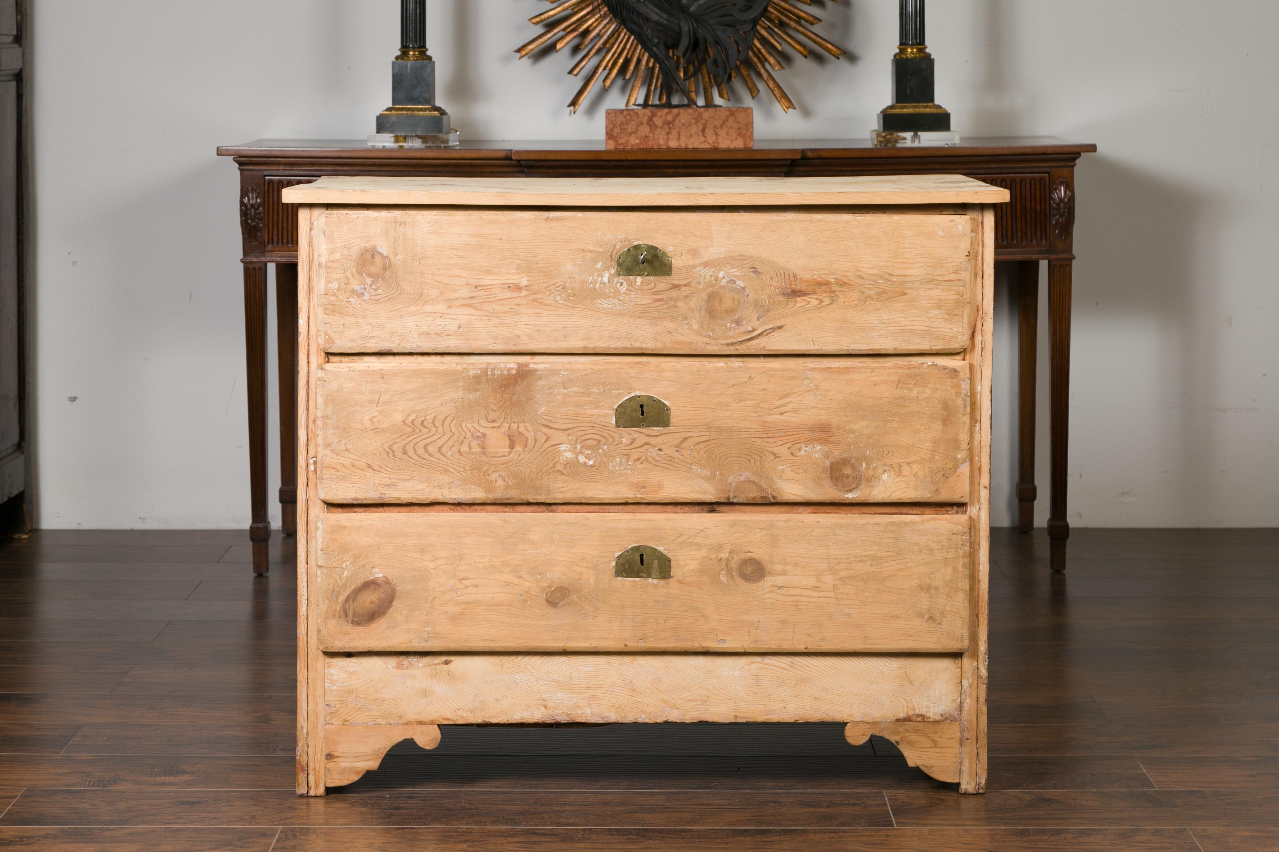 19th Century French Rustic 1880s Bleached Pine Three-Drawer Commode with Carved Spandrels For Sale
