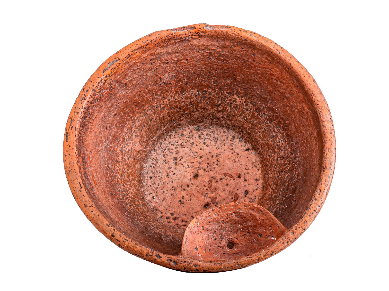 Charming and at the same time rural decorative early 19th century French terracotta was basin.
Looking as it has been around for a while, maybe displayed as an object in a French movie. It has that rustic, rural feeling, yet sophisticated. Truly