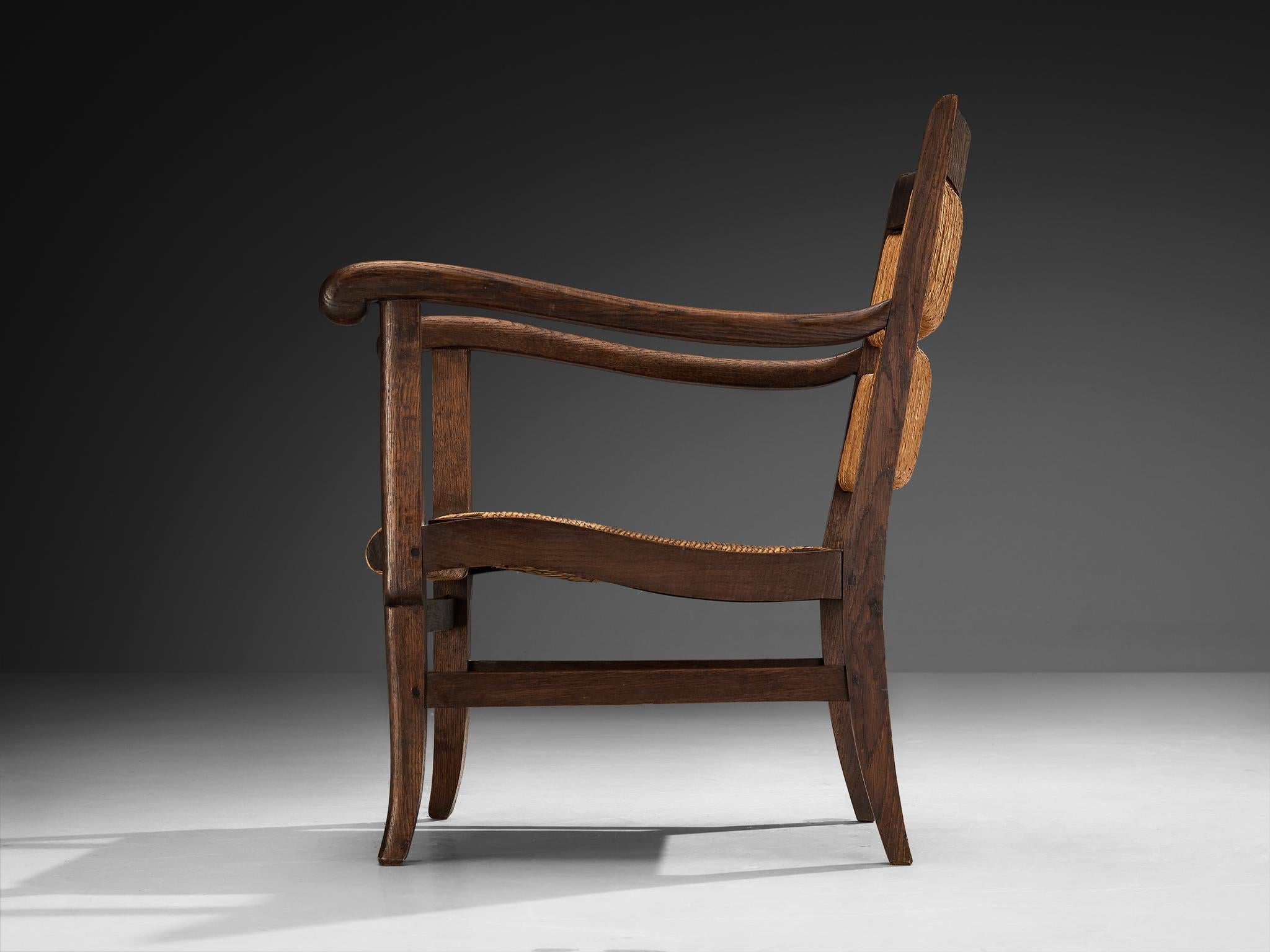 Sillón rústico francés de junco y madera Años 50 mediados del siglo XX en venta