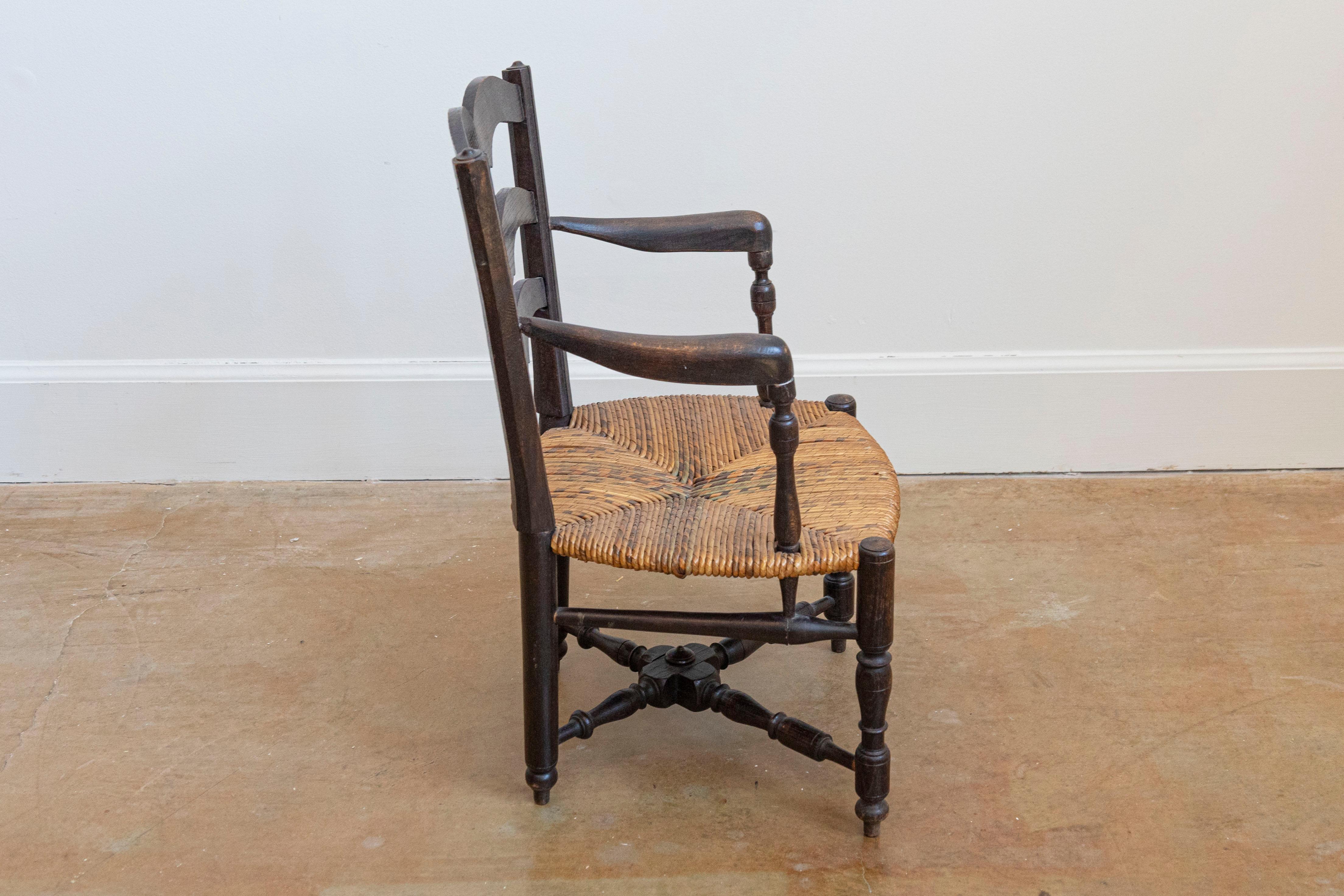French Rustic Dark Oak 19th Century Child's Chair with Ladder Back and Rush Seat In Good Condition For Sale In Atlanta, GA