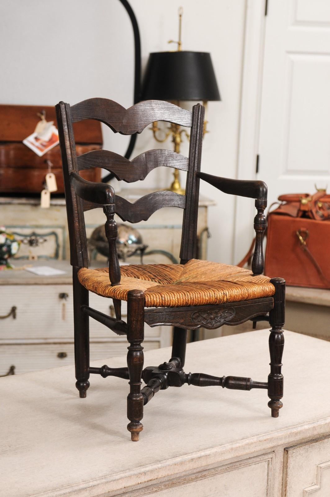 French Rustic Dark Oak 19th Century Child's Chair with Ladder Back and Rush Seat For Sale 2