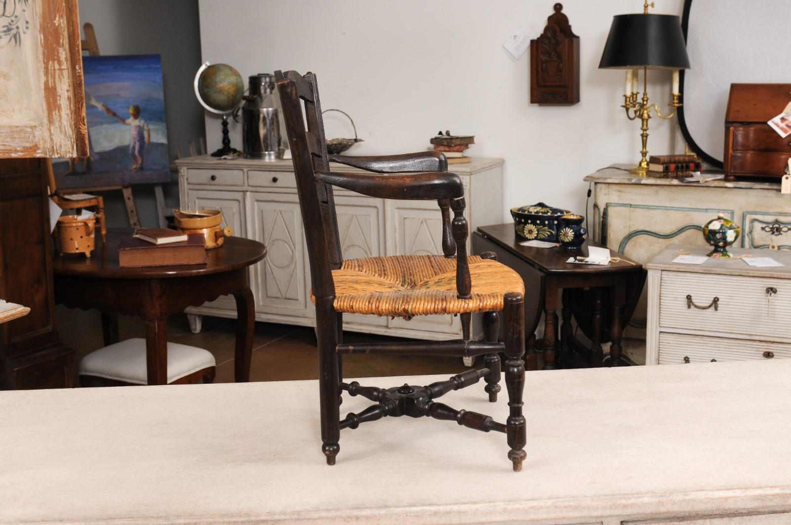 French Rustic Dark Oak 19th Century Child's Chair with Ladder Back and Rush Seat For Sale 3