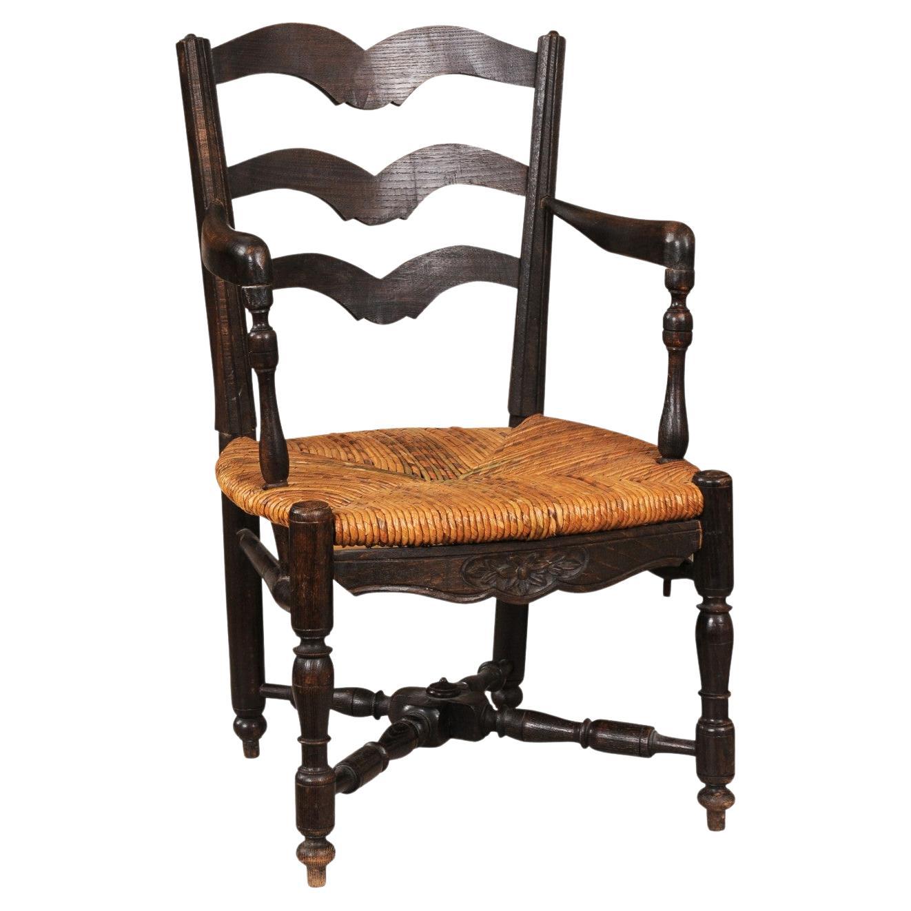 French Rustic Dark Oak 19th Century Child's Chair with Ladder Back and Rush Seat For Sale
