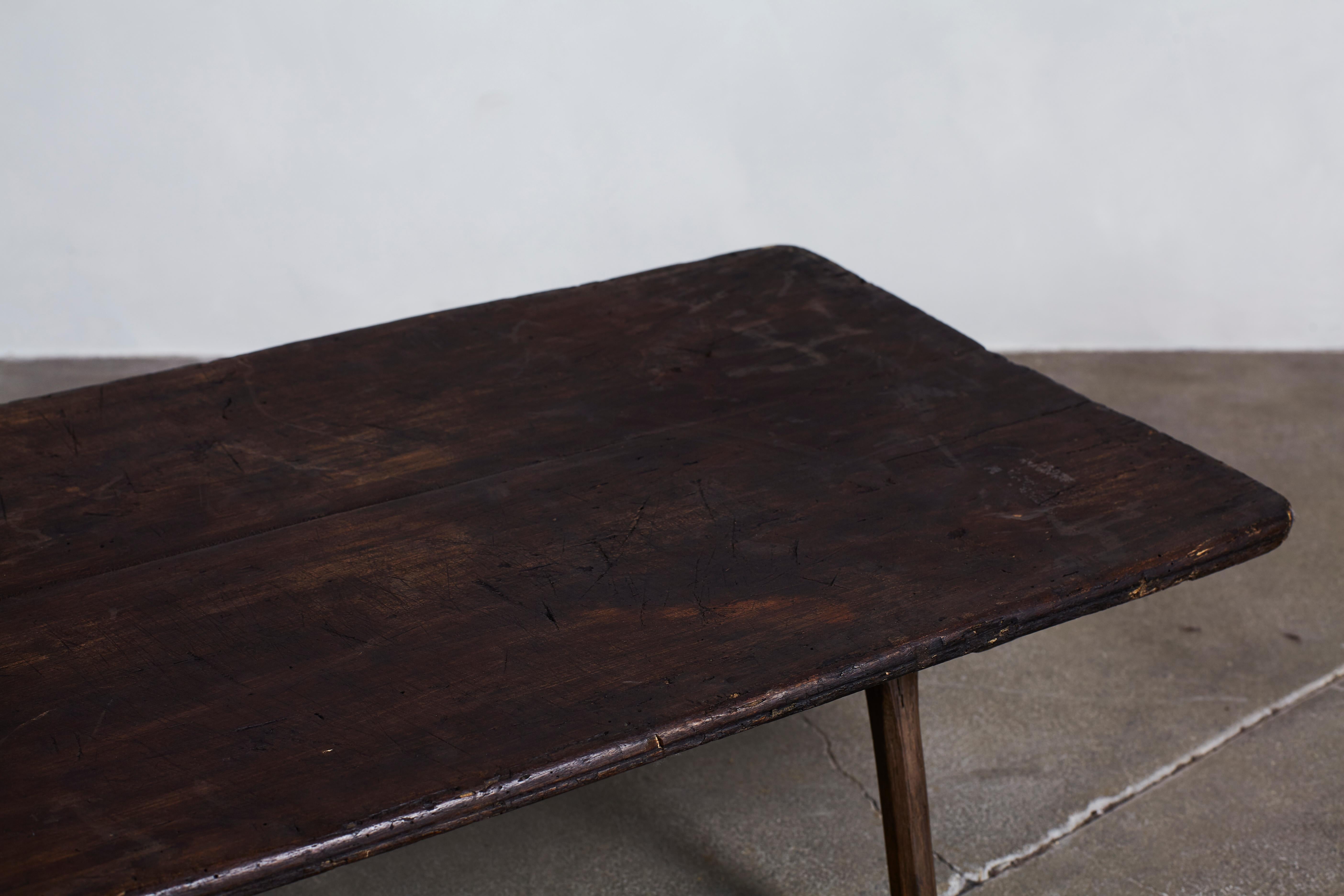 Late 19th Century French Rustic Dark Wooden Low Table with Four Legs