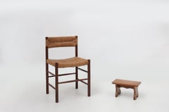 French rustic low church stool in terracotta painted wood, ca. 1900