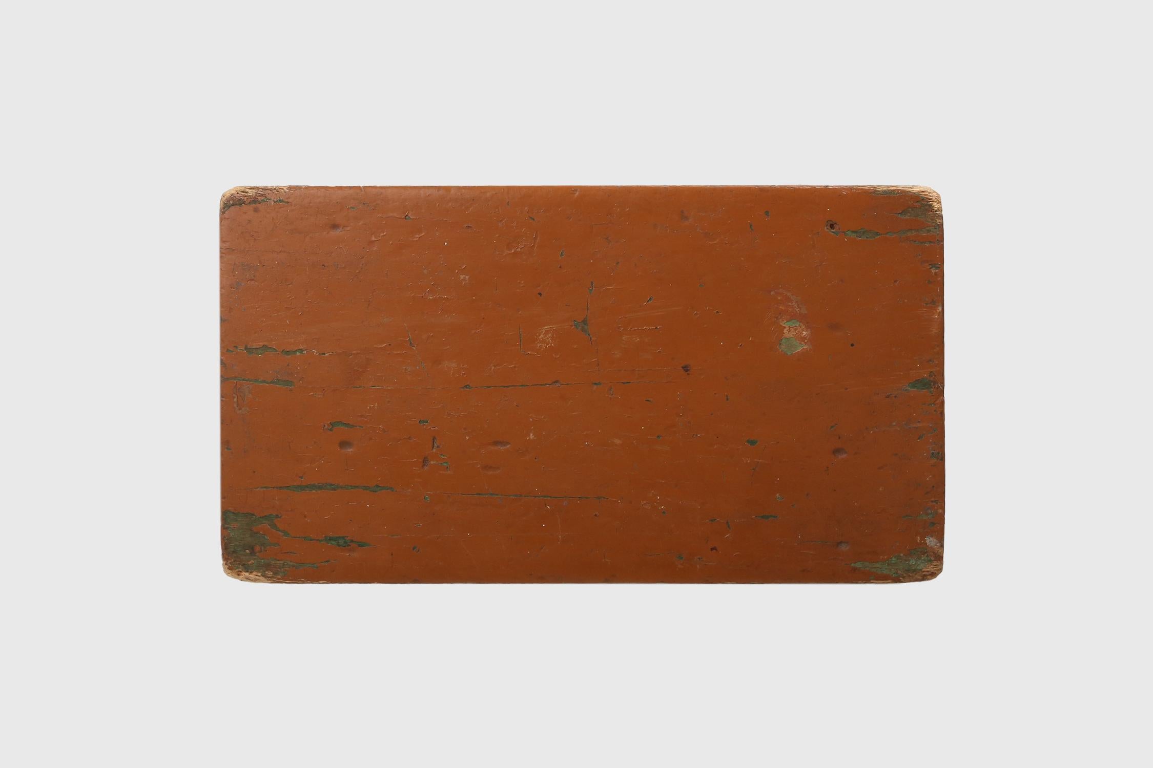 French rustic low church stool in terracotta painted wood, ca. 1900 For Sale 1