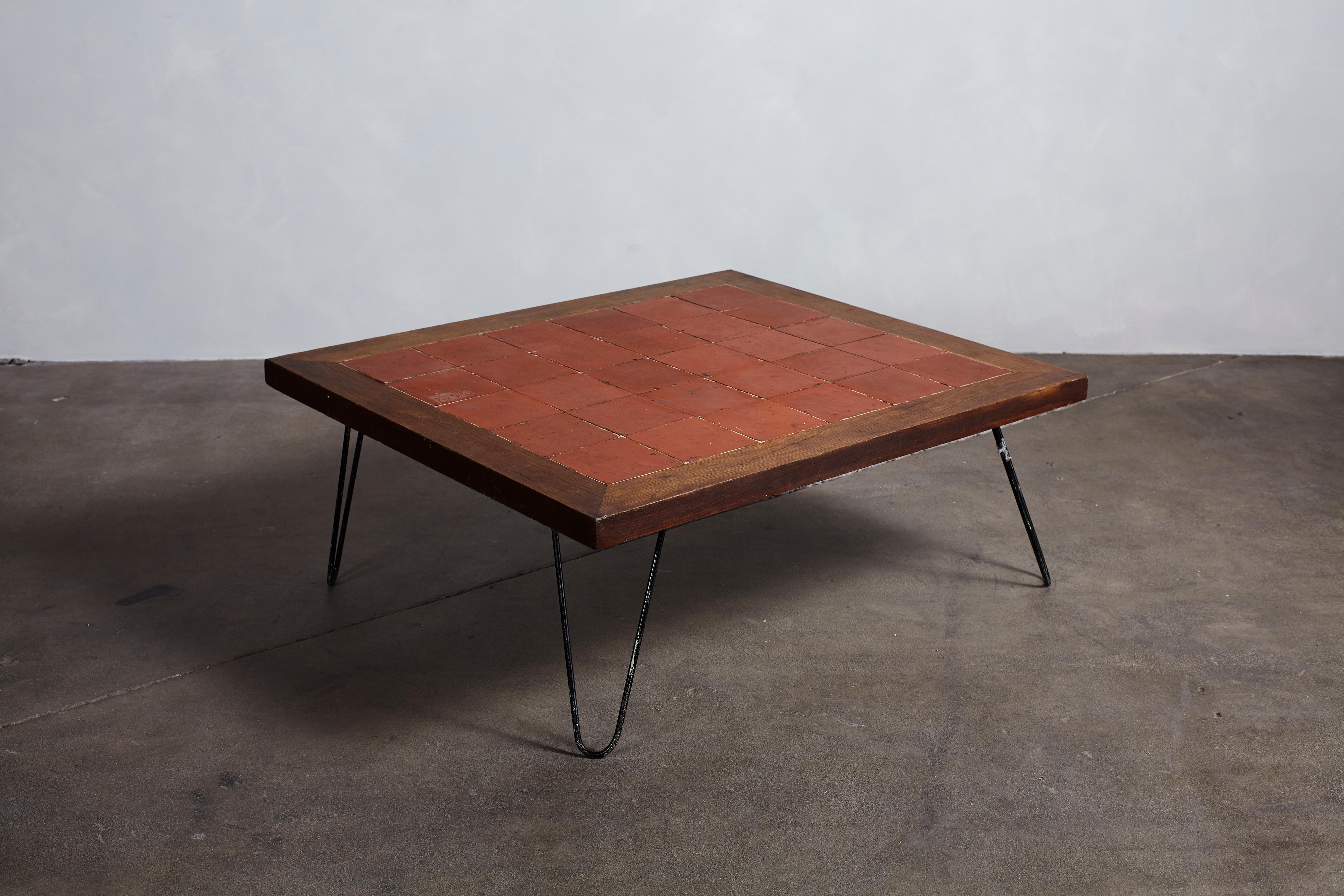 French rustic square terra cotta tile table with wood frame on hairpin legs.