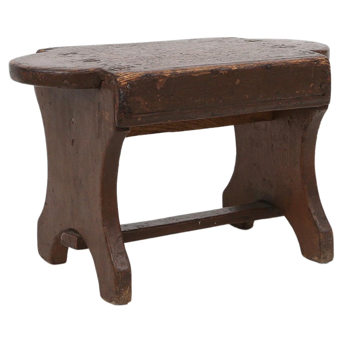 French rustic wooden low stool in painted wood, ca. 1900
