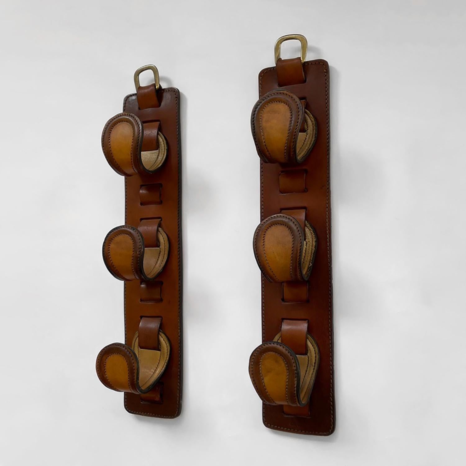 French Saddle Leather Wall Hooks in the style of Jacques Adnet In Good Condition For Sale In Los Angeles, CA
