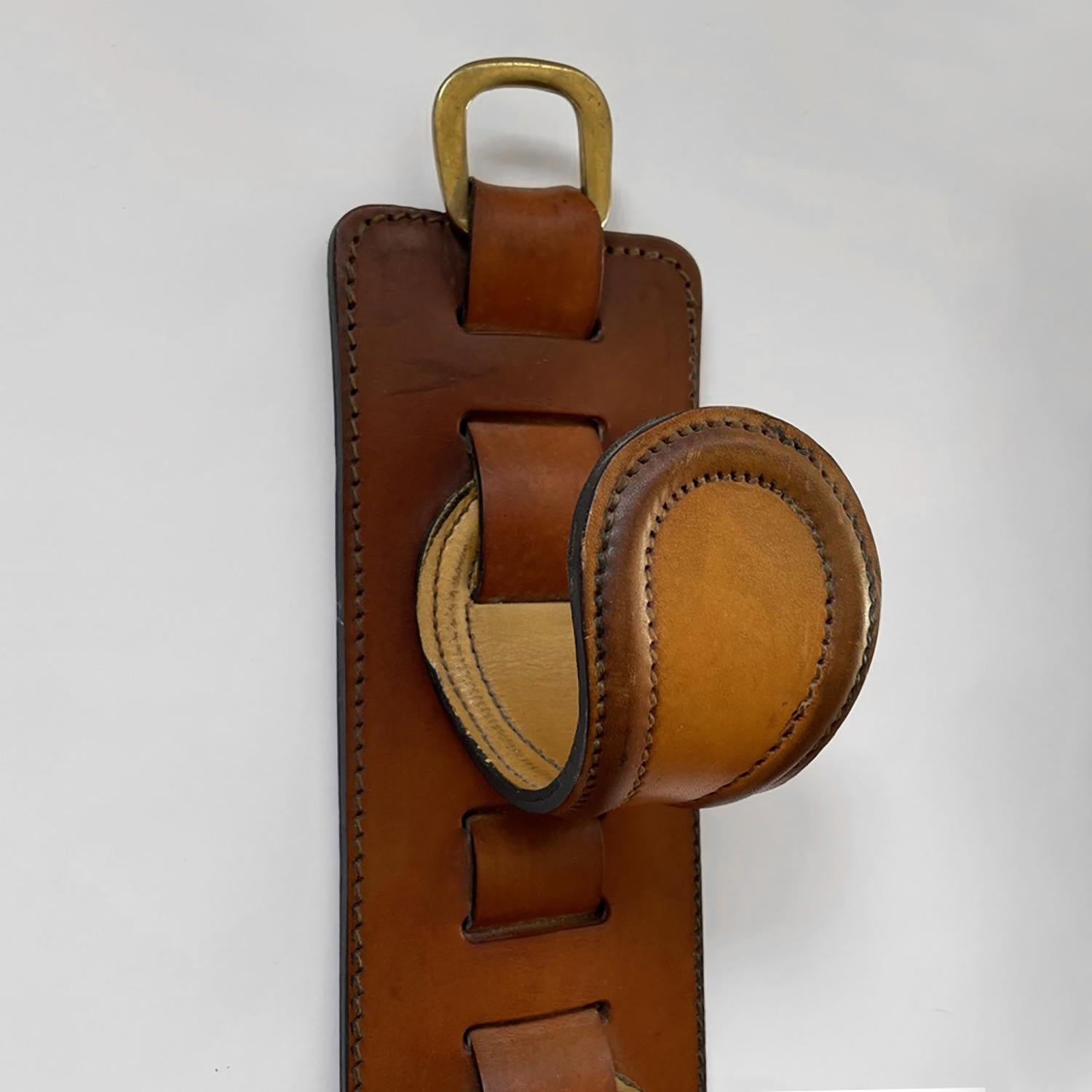 Brass French Saddle Leather Wall Hooks in the style of Jacques Adnet For Sale