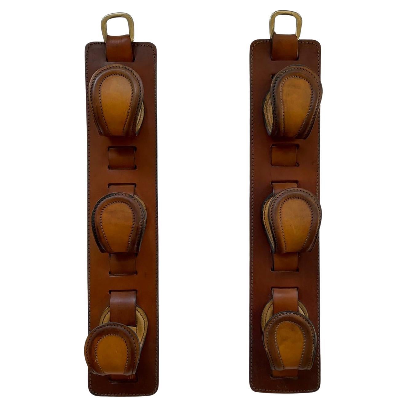 French Saddle Leather Wall Hooks in the style of Jacques Adnet For Sale