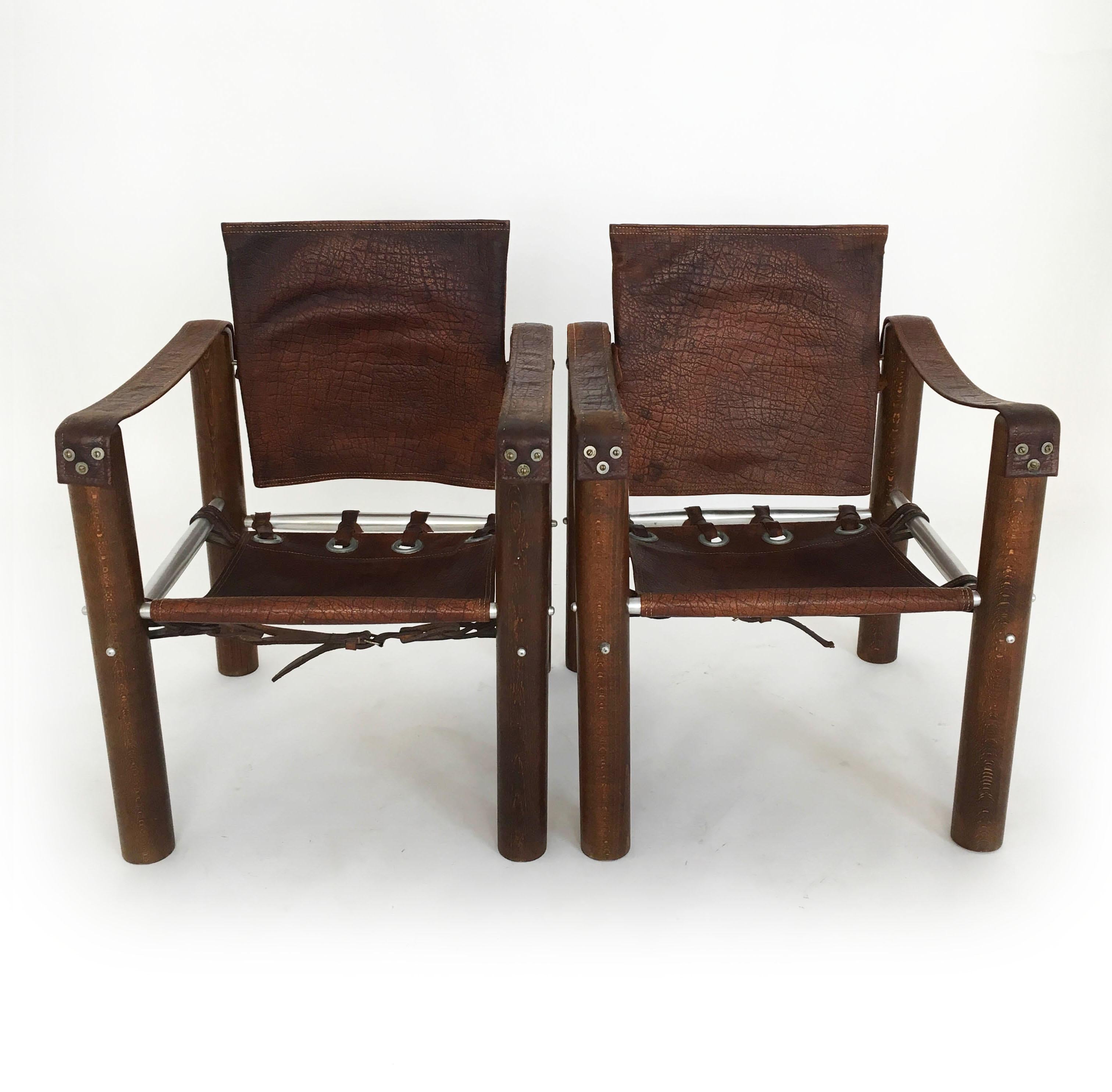 A pair modern safari chairs in patinated leather from Brazil 1970s.