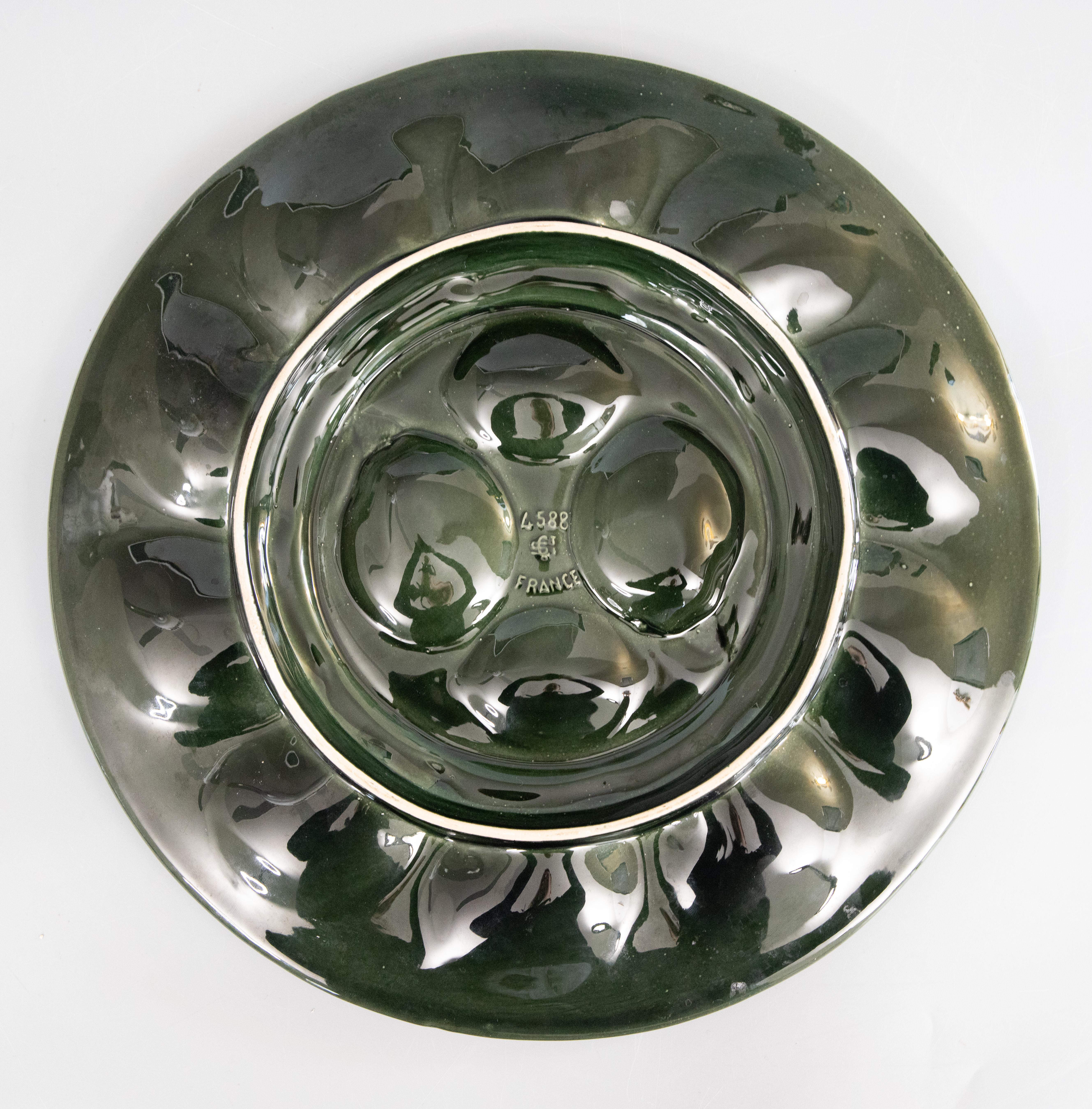 Smaltato Piatto da portata in maiolica francese Saint Clément, verde e giallo, c.C. in vendita