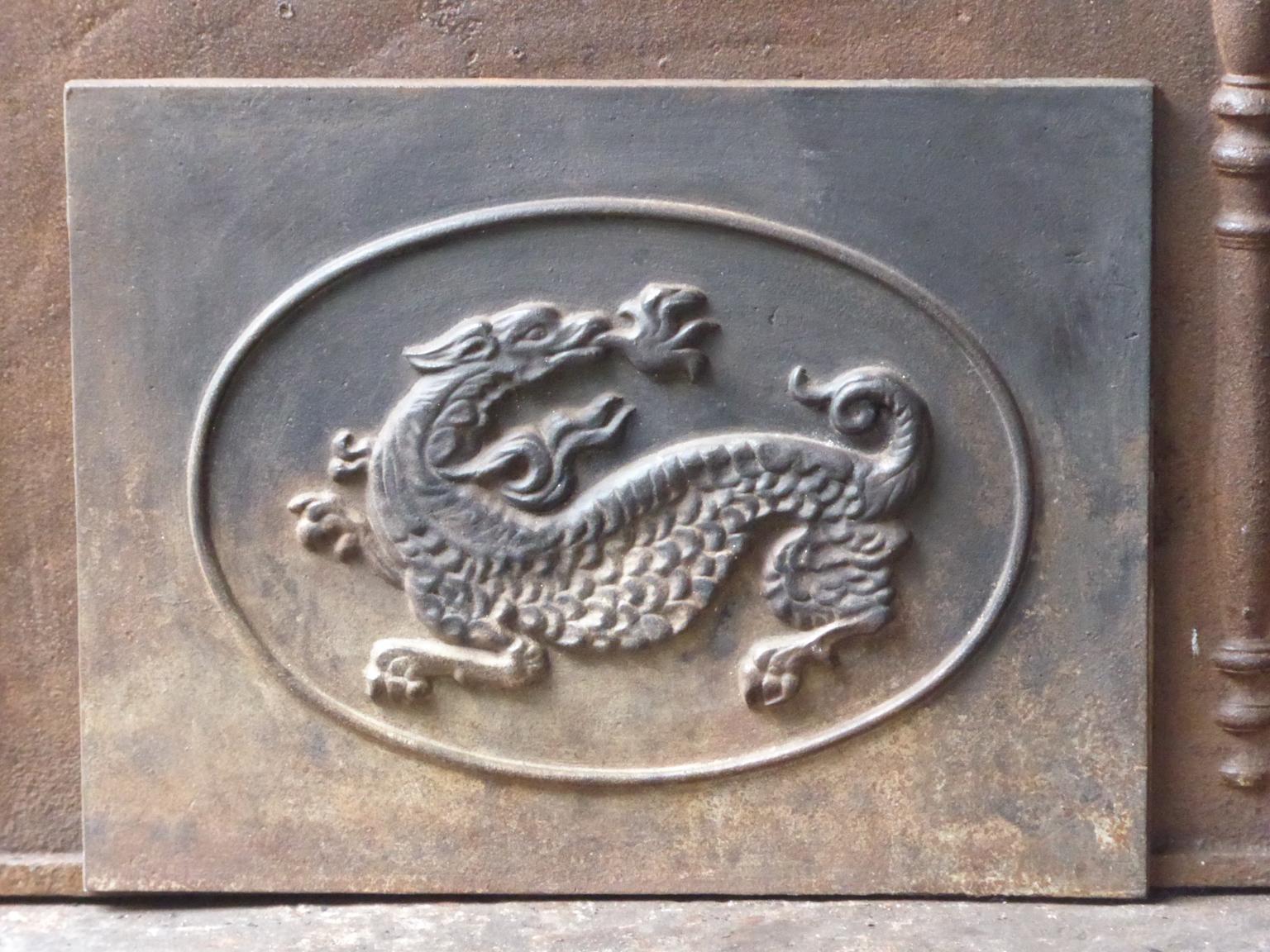 French 20th century Modernist fireplace fireback with a salamander. The salamander is symbol of François I (king of France) who reigned from 1515-1547, during the French Renaissance period.







 