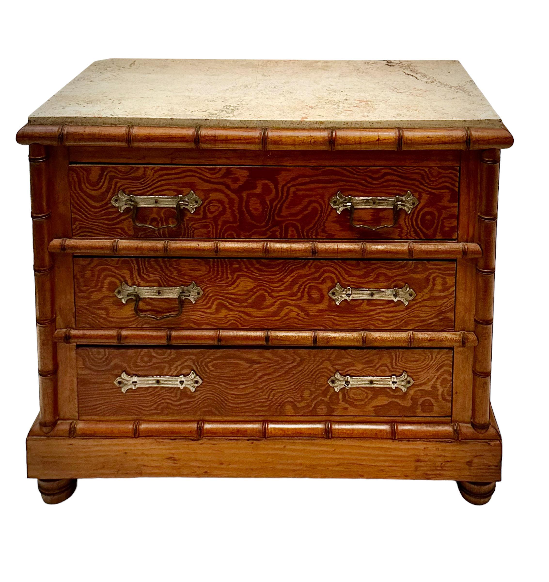 A turn of the century French salesman's sample of a chest in the bamboo style with a marble top. Circa 1900 to 1915. Three handles missing. 