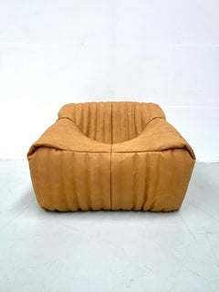 Sedia Sandra francese in pelle di cammello di Annie Hiéronimus per Cinna (Ligne Roset).