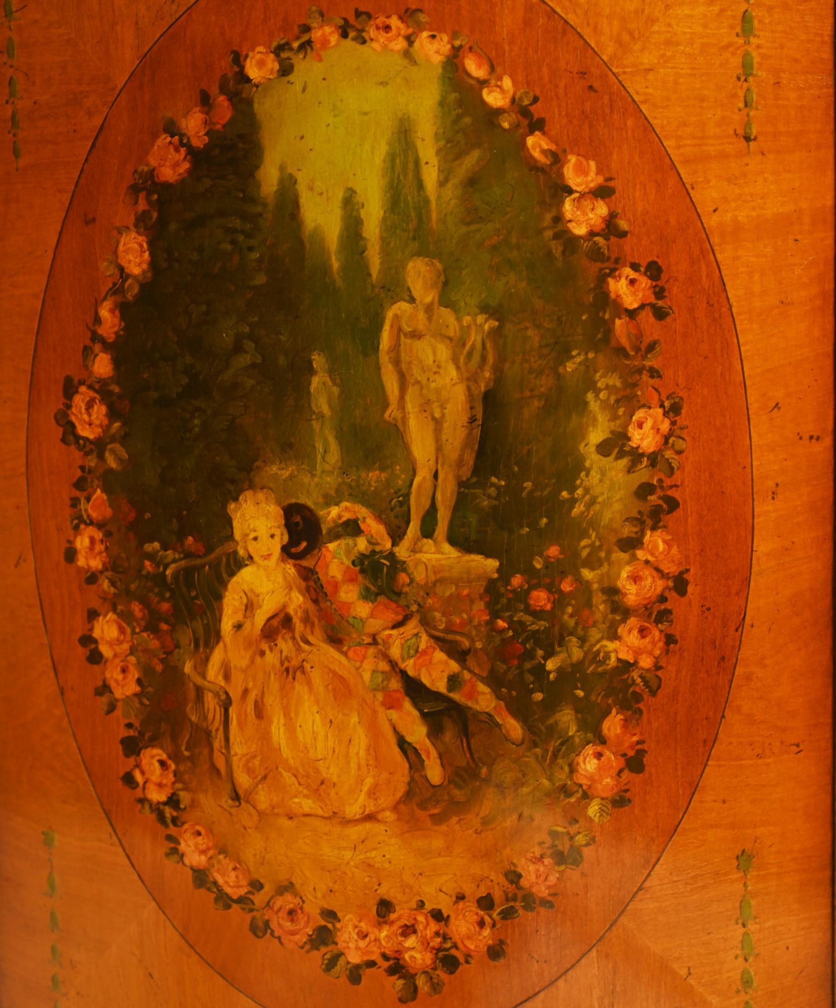 A Demilune satinwood commode painted the the Angelica Kaufman manner 
Circa 1930
Painted features include romantic scenes of young lovers
Bought from a dealer on Rue de Rossiers at the Paris antiques markets
We can ship to anywhere in the world