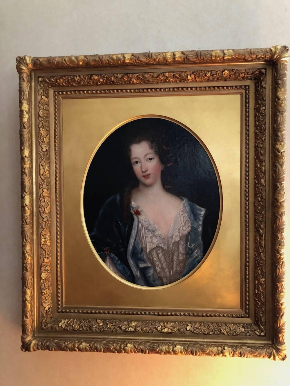 Portrait of a woman in green velvet cloak,
circa 1780
No signature found, displayed in a nice antique frame with brass plaque dedication on the bottom right.
Measures 30 x 22.5 inches, 39.25 x 32.25 inches overall.