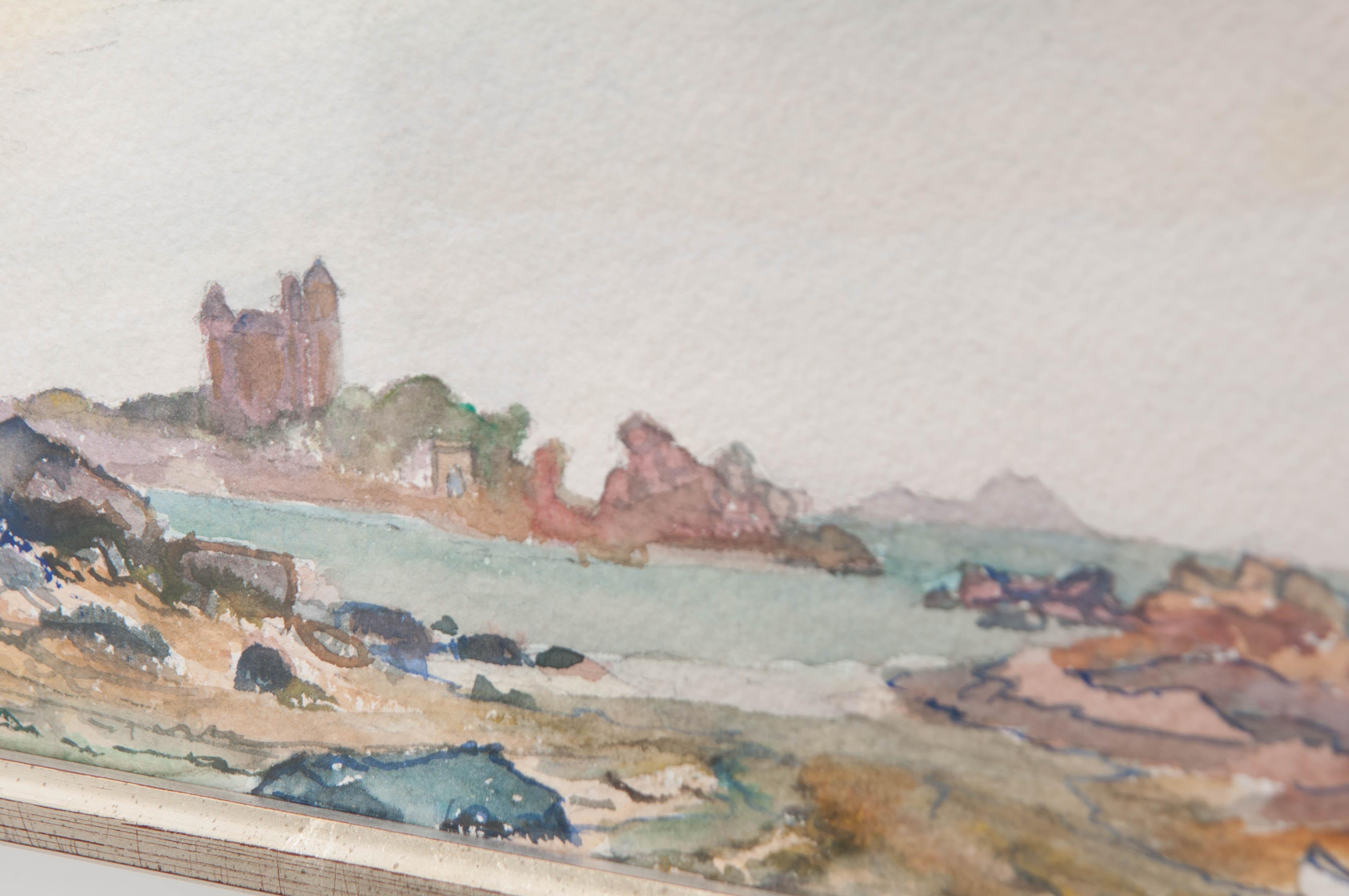 This fine watercolor on paper, circa 1890, is from France and depicts a quiet rocky shoreline with a small bateau and a castle in the distance. It would work beautifully grouped with other small works.