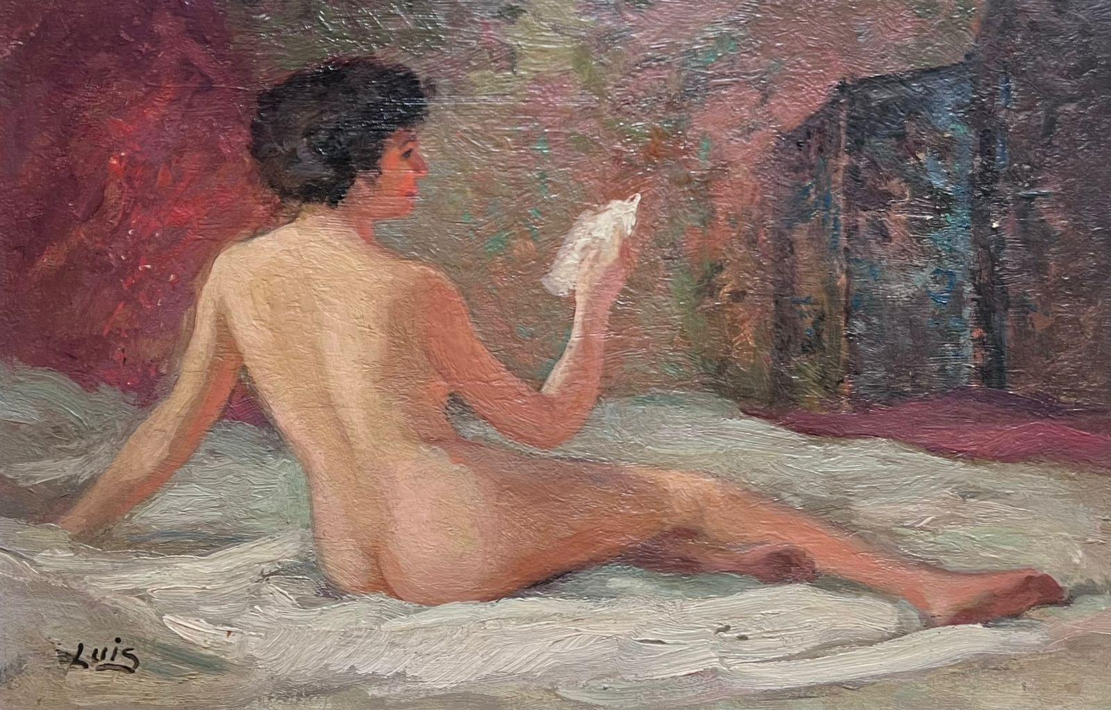 Figurative Painting di French School - Pittura a olio francese della metà del secolo scorso: donna nuda sul letto che legge, firmata e incorniciata