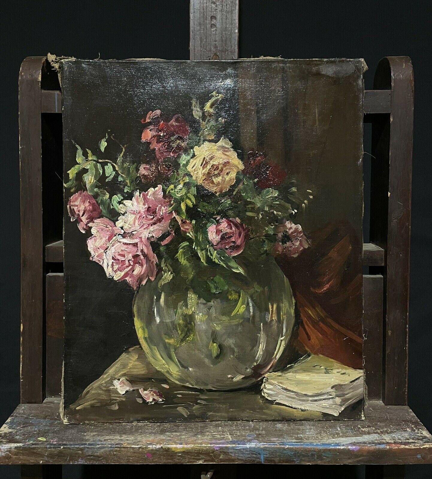 manet roses in a glass vase
