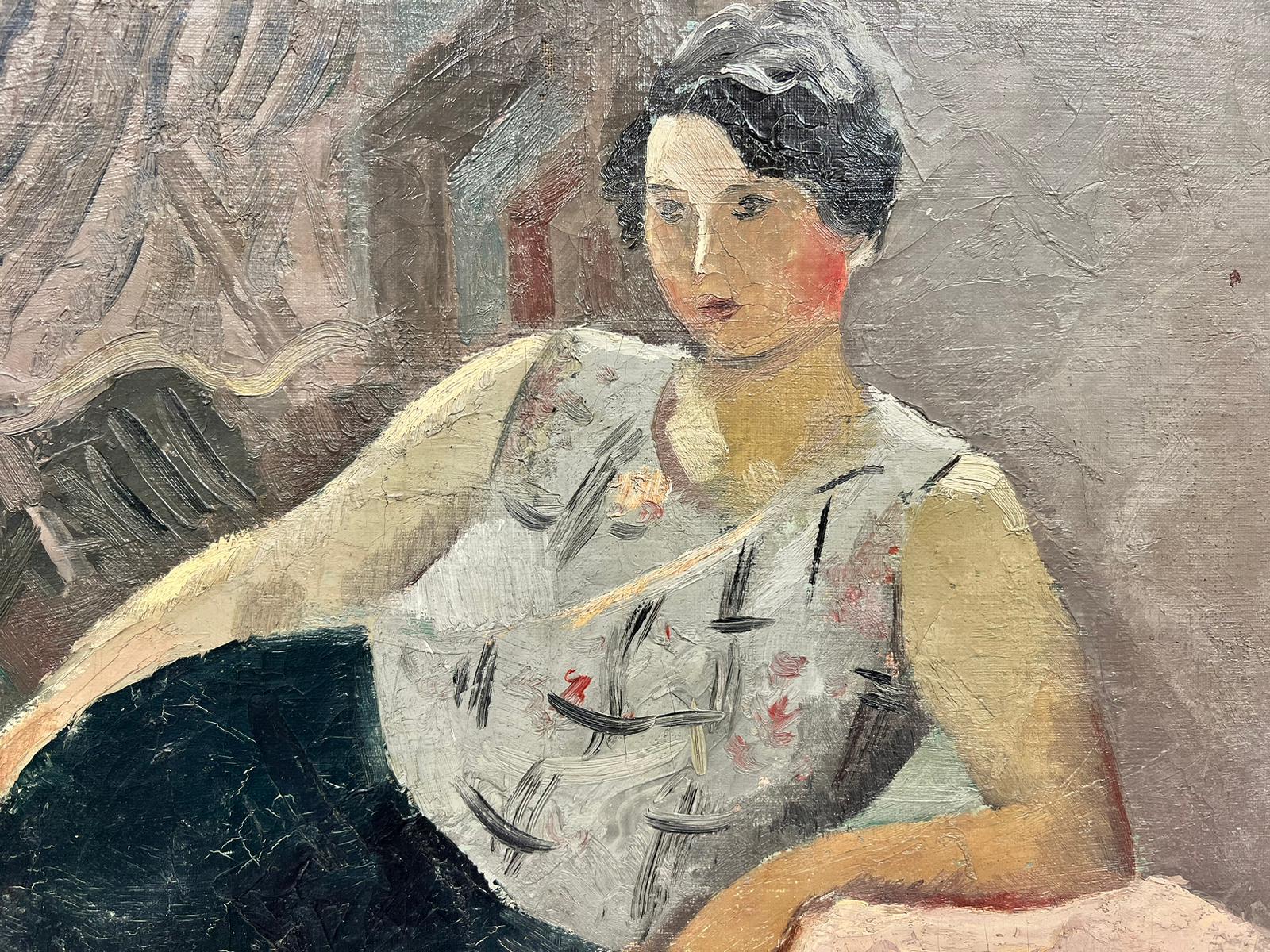 woman reclining on couch painting
