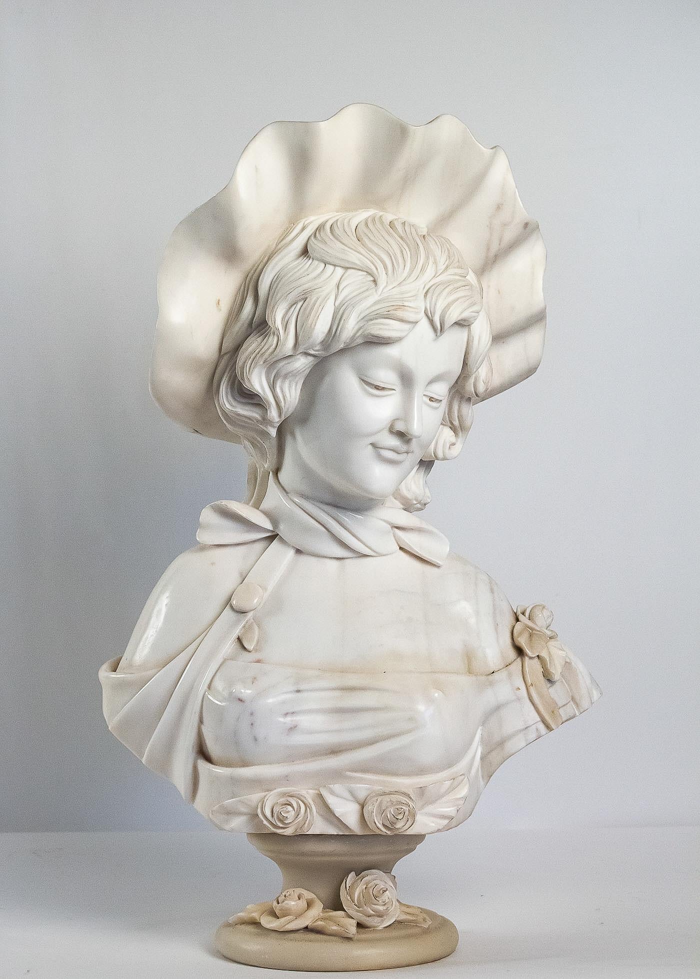 French School white Carrara marble bust a French elegant woman, circa 1900.

Much quality in this beautiful and decorative white Carrara marble sculpture depicting the bust of an elegant woman late 19th century or early 20th century.
The