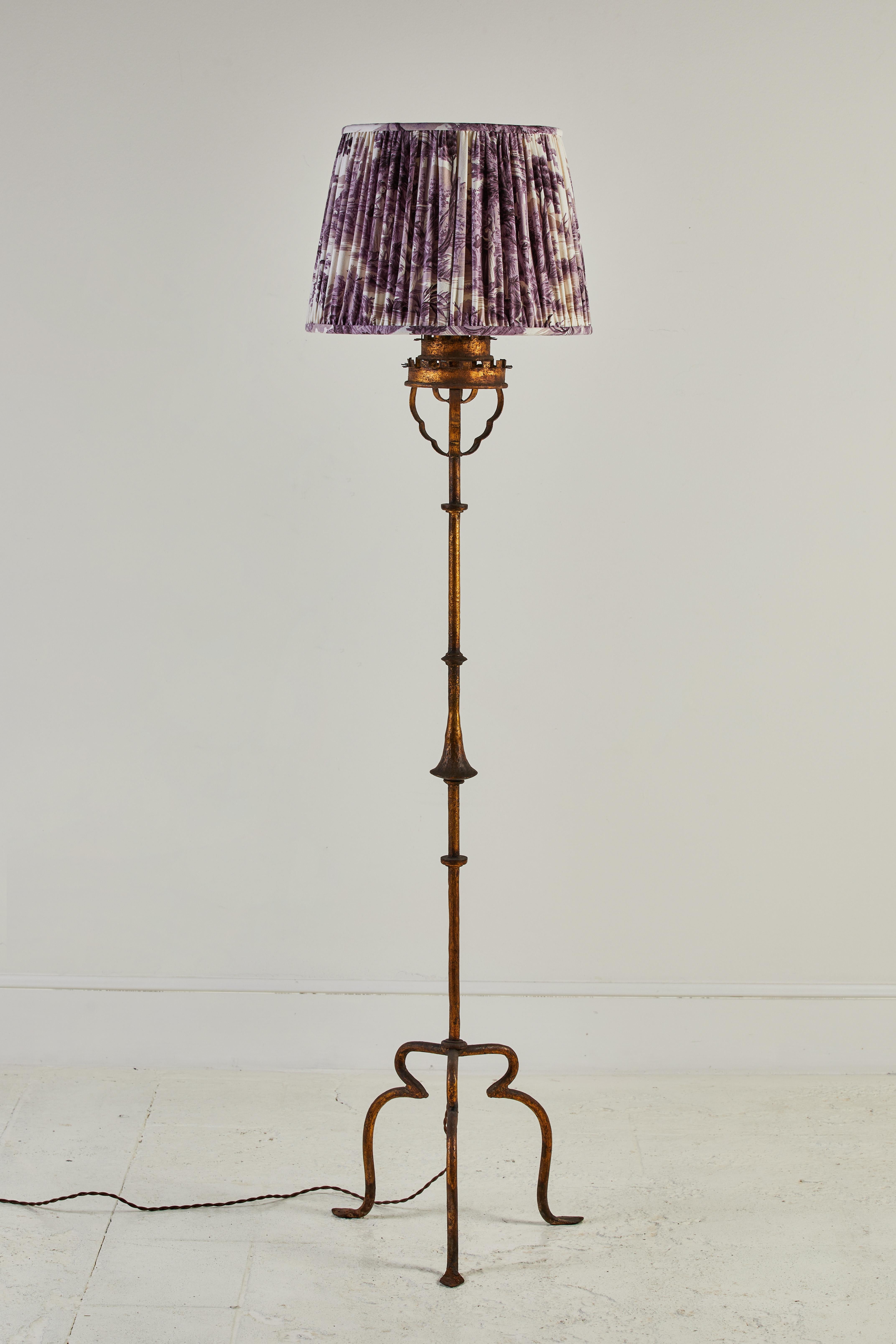French brass floor lamp with scrolled details. Custom violet shirred toile lampshade included. There are two floor lamps available, they are similar but slightly different. One lamp is slightly taller.

The shorter lamp measures: 65