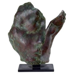 Sculpteur français, visage double face en bronze massif sur base en bronze. 
