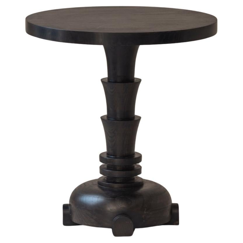 French sculptural dark stained side table from the 1980s For Sale