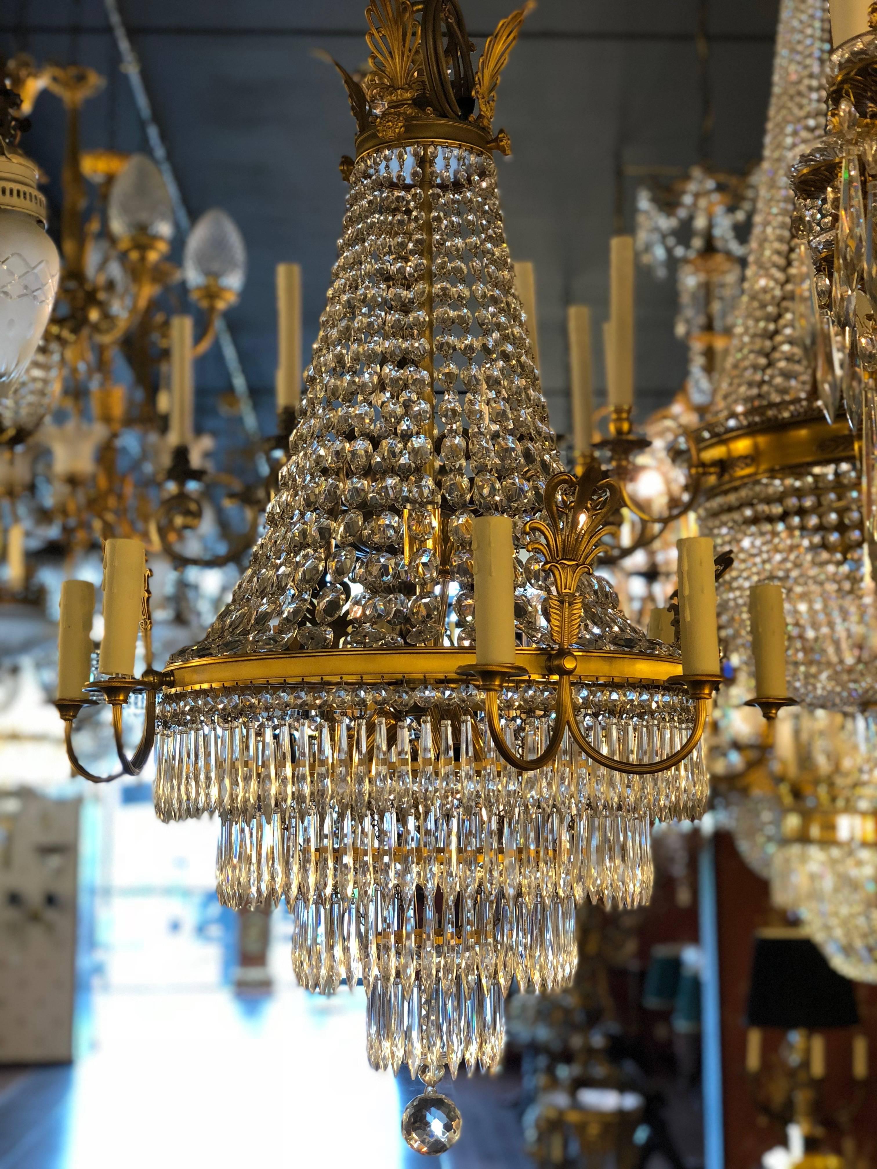This French Second Empire gilt bronze chandelier with 4 x 2 arms recently restored, cabling and sockets were completely renewed.

 