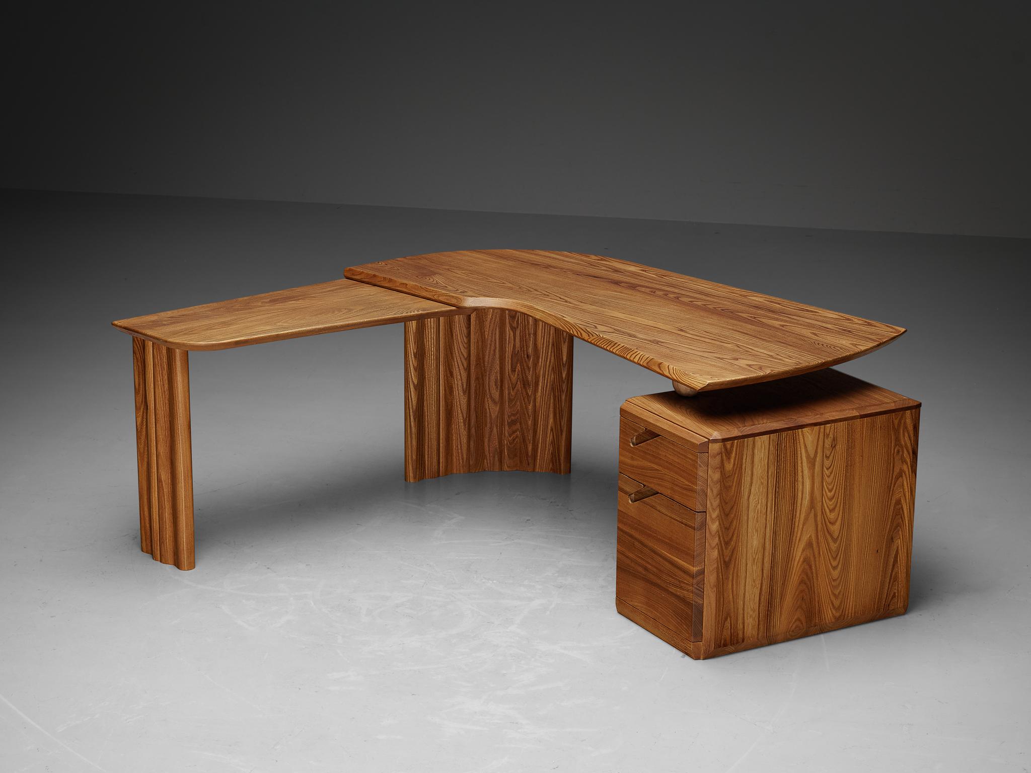 Ebénisterie Seltz, writing desk with return, solid elm, France, 1980s

Situated in a small French region Alsace, Ebénisterie Seltz gained prominence as a workshop recognized for crafting, among others, Pierre Chapo's designs in the 1970s and 1980s.