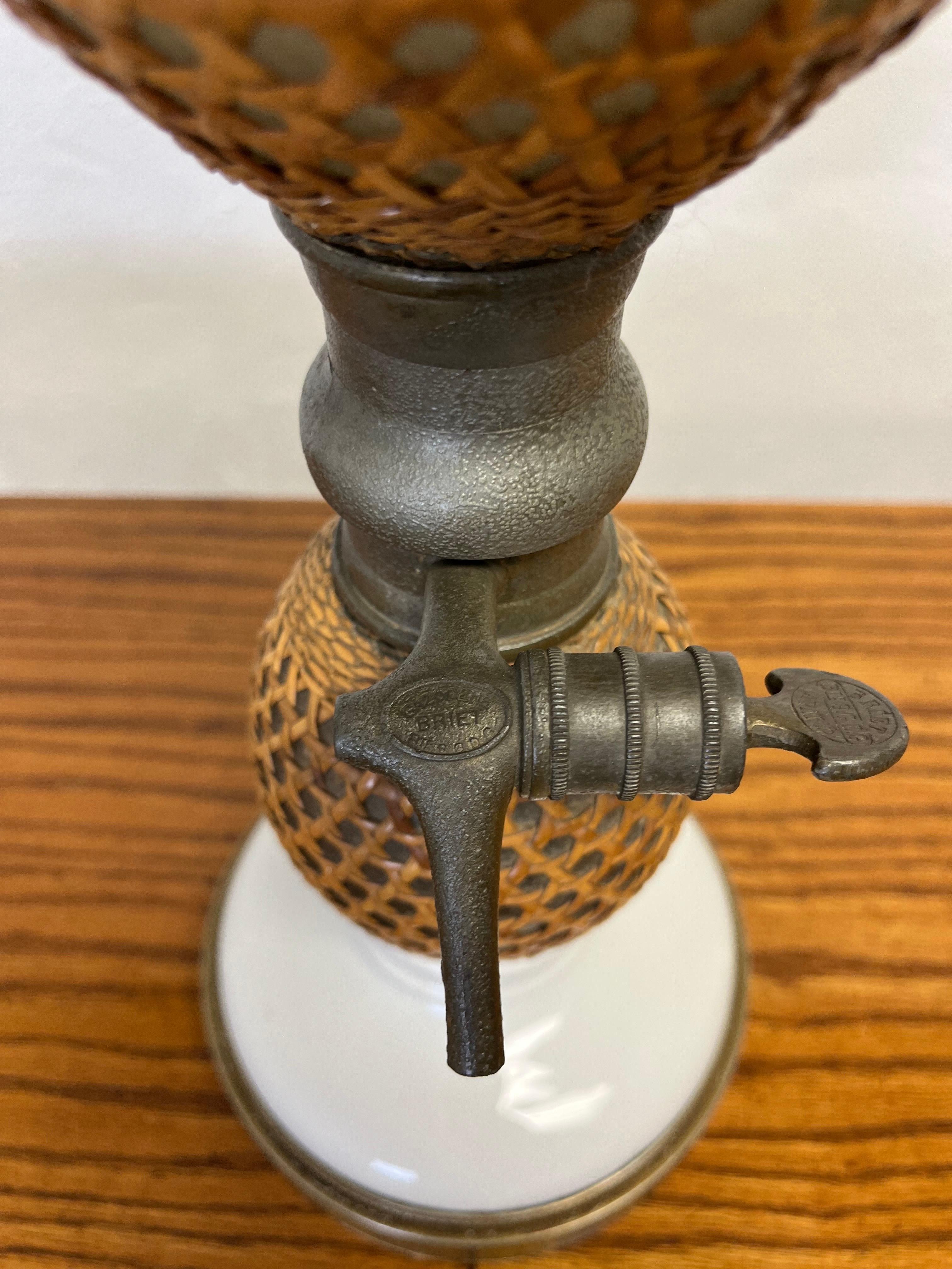 French Wicker Seltzer Bottle Table Lamp In Good Condition For Sale In W Allenhurst, NJ